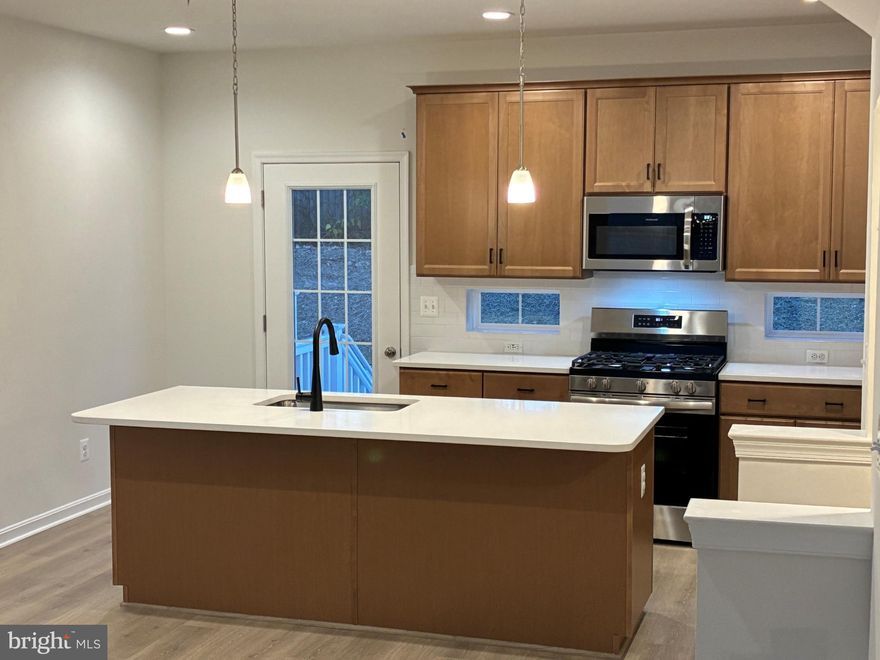 Move-In Ready New Construction Townhome by Ward Communities! 100% Financing Available. Builder offering money towards closing costs!! Stop renting- start owning and building generation wealth for your future!
This beautiful 3-bedroom, 2 full bath, 2 half bath garage townhome offers modern comfort and convenience. Enjoy a spacious 4' x 3' composite deck with steps to the backyard, all appliances included, and numerous upgraded features throughout. Located adjacent to an established single-family home community and within walking distance to Mariner Point Park, this home provides easy access to boating, fishing, and outdoor recreation. Designed for low-maintenance living, this home is ideal for those who want to spend more time enjoying life — perfect for the busy professional or anyone seeking a cozy, affordable lifestyle with water access nearby.  On-site Sales Office located at 315 Sear Court, Joppa, MD 21085.