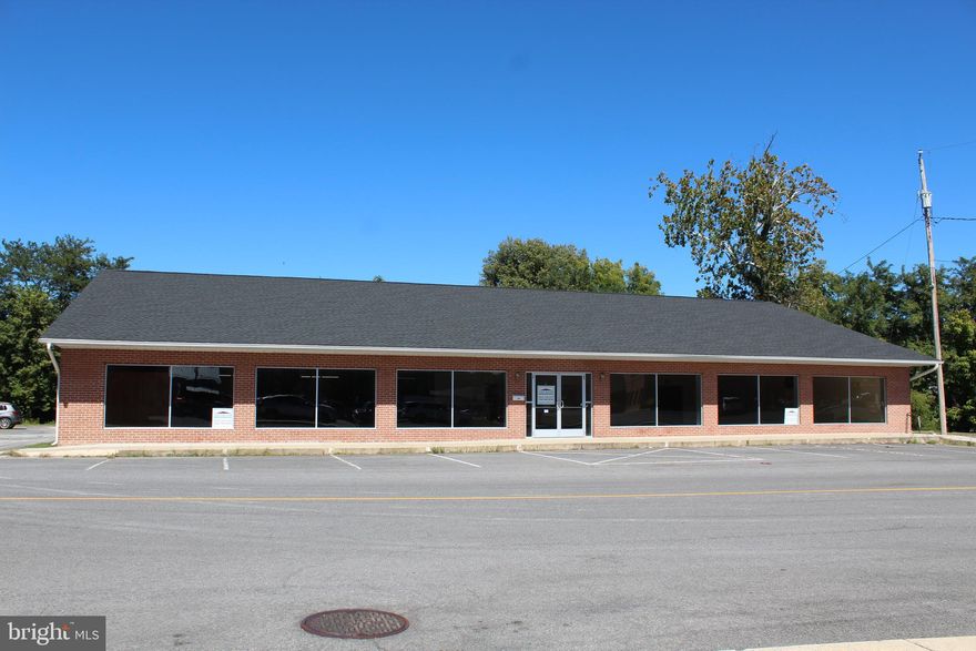 Great Opportunity To Own Your Own Business! This 11,000 Sq Ft building could not be in a better location, a corner lot  just off Main Street! Wall to Wall windows fill the EXPANSIVE Show Room with Natural Light and allow Potential Buyers to window shop as they go by. Behind the counter you will find a Office, Workshop, Bathroom, Warehouse & Two Loading Docks.  Parking? No problem! 9+ Parking Spaces out Front and Overflow Parking on the side. Plug in the open sign and you are ready for business! Don't miss out on the opportunity to be your own boss!  Opportunity is wide open.
