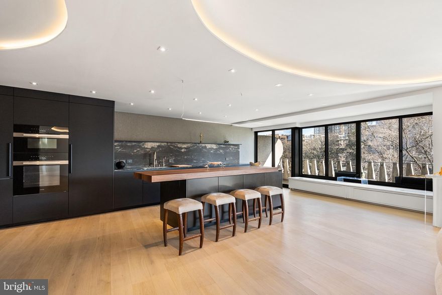 Newly created superb architectural floorplan.  Incredible Boffi Italian design combines functionality and quality to create a  luxurious approach to  living and entertaining.  Fine finishes, materials and  textures define the interior. Chef's kitchen with stunning worktop,  coffee bar, pantry cabinets, Miele appliances including wall oven and  30 inch cooktop, accent lighting. Stunning custom  Boffi closets including a "stroll through" walk in primary closet with directional  lighting. Exquisite spa baths including a primary bath bath with a Smart Glass wall that turns opaque. All with Toto commodes. Beautiful wood flooring. Custom lighting.
Inviting streetscape  and Kennedy Center view. Long 72  ft. balcony. 2020 sq ft interior.
All-inclusive  monthly  fee includes property taxes, utilities, basic cable, internet, and maintenance of HVAC. Watergate East amenities include sparkling newly renovated lobby, 24/7 front desk & doorman service, outdoor heated pool, fitness center, roof terrace  &  garden, plus on-site shops and restaurants. Walking distance to the Kennedy Center, Georgetown Waterfront, bicycle paths, Foggy Bottom Metro, Watergate Hotel & Spa, GWU, restaurants, Trader joes, Whole Foods and more!