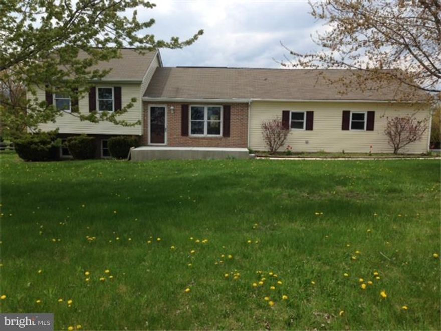 This is a must see home.... be ready to move right into this split level home with 3 bedrooms and 2 1/2 baths located in the Hamburg School District.  Home is less than 23 years old and has just been rehabbed.  All new kitchen from the kitchen cabinets, to tile backsplashes, to ceramic tile floors, and finally stainless steel appliances. All three bathrooms have been updated with new ceramic tile floors, vanities and tile backsplashes.  Home offers a spacious private master bedroom suite on the 1st floor with a master bath shower.  All three bedrooms are spacious and 2nd Bedroom also has walk-in closet.  Living room has real a Bamboo hardwood floor; this is not a floating floor but rather real hardwood.  New wall to wall carpet has been placed throughout the bedrooms.  Just installed, a brand new high efficiency heat pump with electric backup and second source of heat is electric baseboard.  HVAC system includes central air conditioning for those hot summer days.  The lot is 1.9 acres, with a 1 car attached garage and a 2nd garage door for additional storage with still plenty of room to work. This property is located in a quiet rural setting, but is also less than a 10 minute drive to the Route 78 and 61 interchange with the famous Cabella's shopping center.  Lot is relatively flat and offers a private fenced in back yard for your outdoor entertainment, pets or play area. Lower taxes as well.