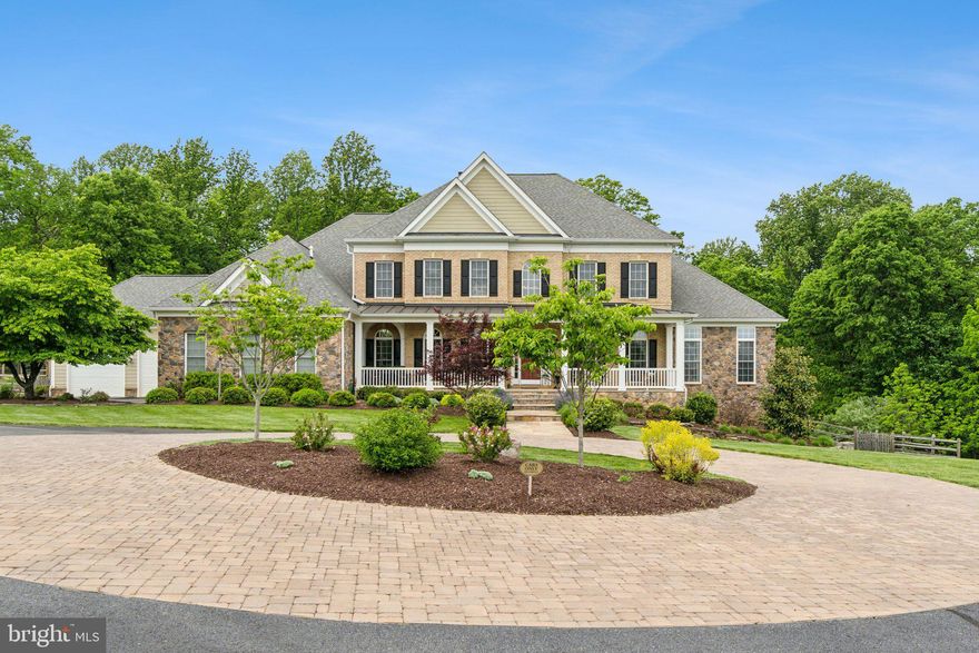 ***LUXURIOUS ESTATE HOME IN DESIRABLE LEESBURG LOCATION***
Welcome to this stunning 8,000 sq. ft. single -family estate nestled on 3 acres of beautiful landscaping, in one of Leesburg's most sought-after neighborhoods.  This expansive home features 5 spacious bedrooms, 1 Bonus room, 7 full bathrooms, plus 2 half bathrooms. 
The heart of the home is a spectacular chef's kitchen, equipped with top-of-the- line appliances, custom cabinetry, walnut island, and premium finishes. Perfect for entertaining and culinary creations. Soaring ceilings, elegant hardwood floors and generous living space throughout. 
**MAIN LEVEL OWNER'S SUITE** With a spa-like bathroom, 10ft. ceiling,  heated floors, towel warmer and separate oversized walk-in closets. Double staircases, plus an ELEVATOR for a smooth ride up or downstairs. 
Oversized laundry room and pantry area, leading out to the 3/4 car garage, with extra space for storage. 
The upper level boosts a spacious owner's suite complete with a luxurious bathroom and oversized walk-in closets. The suite also includes a private bar area and a comfortable sitting area for relaxation. Two additional generously sized bedrooms complete the upper level, providing comfort and style for family or guests.
The fully finished walkout basement offers exceptional  additional living space, featuring a large bedroom with a spacious closet, 2 full bathrooms, and a well appointed kitchenette-ideal for guests or extended family.   

Step outside to a beautifully landscaped backyard that's perfect for entertaining. Enjoy the custom-built outdoor kitchen with a pizza oven, grill and fireplace. A charming patio area, raise garden beds, custom storage shed and playground equipment-creating a perfect outdoor oasis for all ages.

This meticulously maintained home is in excellent condition, featuring a new roof installed in 2023. It is equipped with 3 HVAC systems,  a whole house generator, and an elevator, offering both comfort and convenience.  **NO HOA **