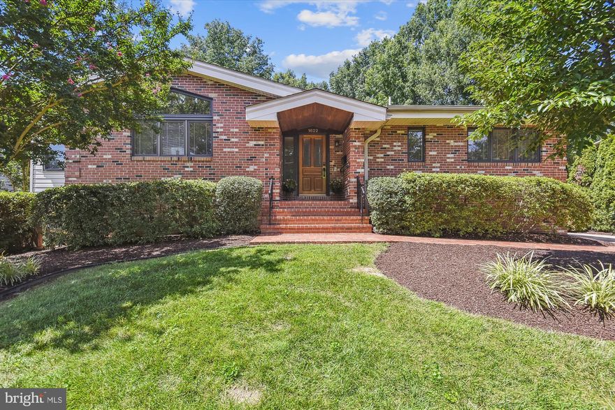 Move right in to this wonderful rambler situated on almost a third of an acre with mature, professionally maintained landscaping in one of McLean's most popular neighborhoods!  Expanded and updated kitchen features cathedral ceilings, two tone cabinetry creating a thoroughly modern vibe and breakfast area with new lighting.  Spacious formal dining room.  Beautiful hardwood flooring throughout the main level.  Cathedral ceilings in spacious living room with access to outside through an attractive sliding glass door to patio space.  Primary bedroom is large enough to accommodate a sitting area and the ensuite bath features a dressing area and separate shower space.  Two additional bedrooms share a hall bath.  Light and bright walkout lower level features a recreations room with fireplace insert, a fourth bedroom suite perfect for nanny or in-law, a large utility room with tons of storage space, including a cedar-lined closet and exercise corner.  Walk out to a level back yard with mature landscaping and plenty of space for playing.  Roof in 2015, furnace 2017, A/C compressor 2013, gas tankless hot water heater 2010.  No maintenance all brick with all wood and soffits wrapped.  Meticulous attention to detail has been paid to ready this home for the market including fresh paint, carpet replacement, many new light fixtures to name a few.  
Side load two car garage with ample space to have a workshop.  Walk to sought after Kent Gardens Elementary with its award-winning French Immersion program and McLean High School.  A short hop to Metro and downtown McLean/Tysons, 495, I-66 and George Washington Parkway.  This one is special!