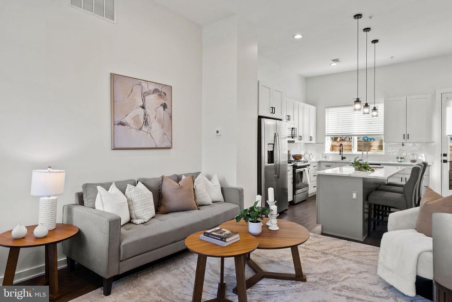 Welcome to 2235 N. Hope Street, a stunning home that immediately impresses with its sense of space, open floor plan, and high ceilings.
The main level is flooded with natural light and flows effortlessly from the spacious living & dining area into a beautifully appointed kitchen. Features include Carrara quartz countertops, lots of cabinetry, including a pantry, and a convenient wall of built-ins, which would make an ideal serving station, coffee bar or wet bar. From the kitchen is access to the first of two private outdoor spaces, perfect for grilling.
The second floor offers bedrooms lush with natural light and tall ceilings, a modern hall bath, and a dedicated laundry area with full size front loading machines. On the third-floor you’ll find the ideal primary suite, complete with a walk-in closet and an en-suite bathroom featuring a free standing soaking tub, double vanity and a large glass-enclosed shower with a built in bench, perfect for relaxation. Oversized front windows flood the space with natural light. Just outside the suite, a hallway wet bar adds convenience for your morning coffee, as you head up to the expansive roof deck—an ideal spot to relax or entertain while enjoying panoramic city views.
The fully finished basement provides excellent flexibility of use, featuring a full bathroom, making it perfect for a guest suite, home office, or secondary living room. 
Located on the border of Norris Square and East Kensington, this home is just moments from the continuously growing dining, shopping, and nightlife of East Kensington and Fishtown. Enjoy easy access to neighborhood favorites, green spaces, I-95 and the Market-Frankford Line (El) for a quick commute to Center City.