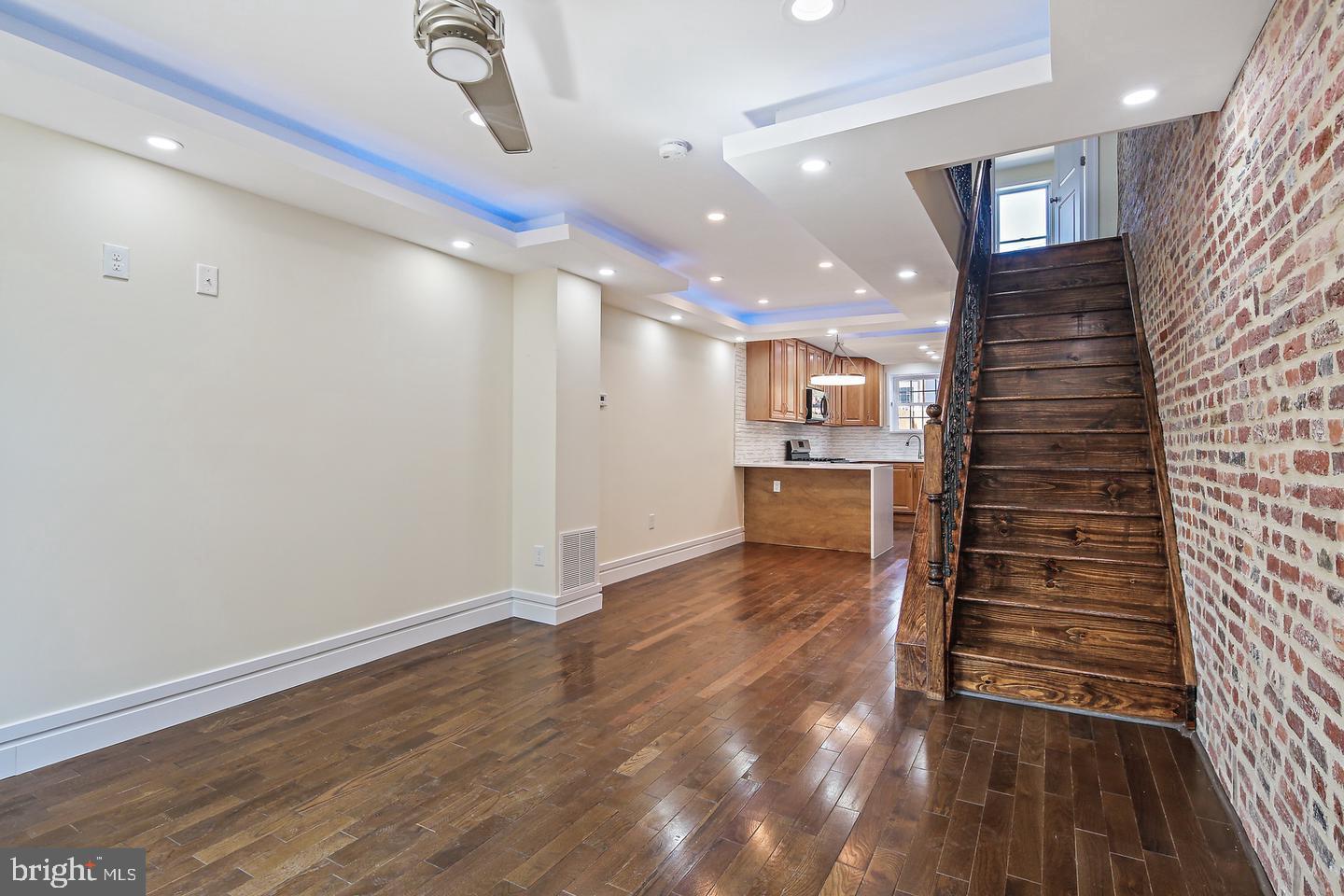 Charming 2-bedroom townhouse with two fully finished levels, offering abundant natural light throughout.
Enjoy the open floor plan with gleaming hardwood floors, a stunning bathroom, and modern updates throughout—including stainless steel appliances and granite countertops. Convenient upper-level laundry with washer and dryer.