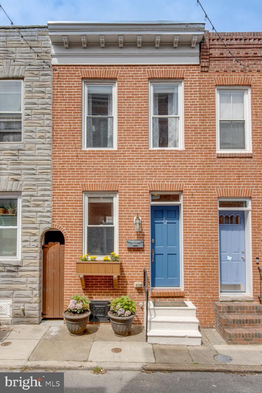 COMING SOON!!  OPEN HOUSE SATURDAY 6/17 12-2.  Check out this gorgeous Two Bedroom Two full and one half Bath row home in the sought after neighborhood of Butchers Hill.  A perfect mix of Baltimore charm and modern updating with beautiful & unique features not to be missed.  Walk into the living room and appreciate the gorgeous hardwood flooring and the flowing natural light.  As you walk through you will see the renovated kitchen with granite countertops, stainless steel appliances, a large farmhouse sink and a built-in breakfast bar offering ample seating. Off of the kitchen is a nook perfect for your home office and the main level powder room. Walking out to the back is your oversized PARKING PAD, a city dream.  As you head upstairs you will find two spacious bedrooms each with hardwood flooring and their own bathrooms. The master bedroom has access to the rear roof and its bath is updated with a whirlpool tub and shower combo.   Heading downstairs you will find an unfinished basement offering plenty of space for storage and a laundry area with a full washer and dryer.  This home has recessed lighting, neutral paint, exposed brick and an amazing location!!!  Just a few blocks from Johns Hopkins and Patterson Park, walking distance to Canton, Fells Point, Harbor East, and plenty of shopping (cafes, restaurants, The Shops at Canton crossing with Target, clothing stores, grocery stores, and more). Plus, easy access to the Inner Harbor, the Harbor Tunnel, Rte 95, 895, 40, and 83.