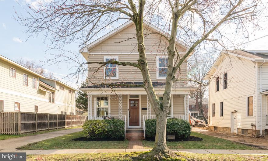 Incredible, renovated Del Ray beauty! Located in the heart of Del Ray, enter this magnificent home from the charming front porch. As you walk in the main level, you are wowed by the open and easy flow of the floor plan. The dining room leads into the living room and kitchen. The gourmet kitchen, with its large island, upgraded countertops, stainless appliances, ample cabinetry and storage w ill wow even the most discriminating chef.  Also found on the main level are two bedrooms and a full bathroom.  These spaces can be used for guests or an office. A laundry room and utility room round out this level. On the upper level, three bedrooms and two bathrooms can be found. The master suite is truly incredible. Spacious with a tray ceiling, two walk-in closets and an en-suite bath - this space is a spa-like getaway!Two large bedrooms with ample closet space and a hall bathroom can be found with additional storage closet space. The yard is an escape from everyday life - enjoy the built-in fire pit, patio and large yard - ideal for entertaining.  Leave your car in the driveway or in one of the two garage spaces and walk to everything that Del Ray has to offer! Less than a block from "The Avenue" and walkable to Metro, you don't want to miss this beauty! Welcome Home!