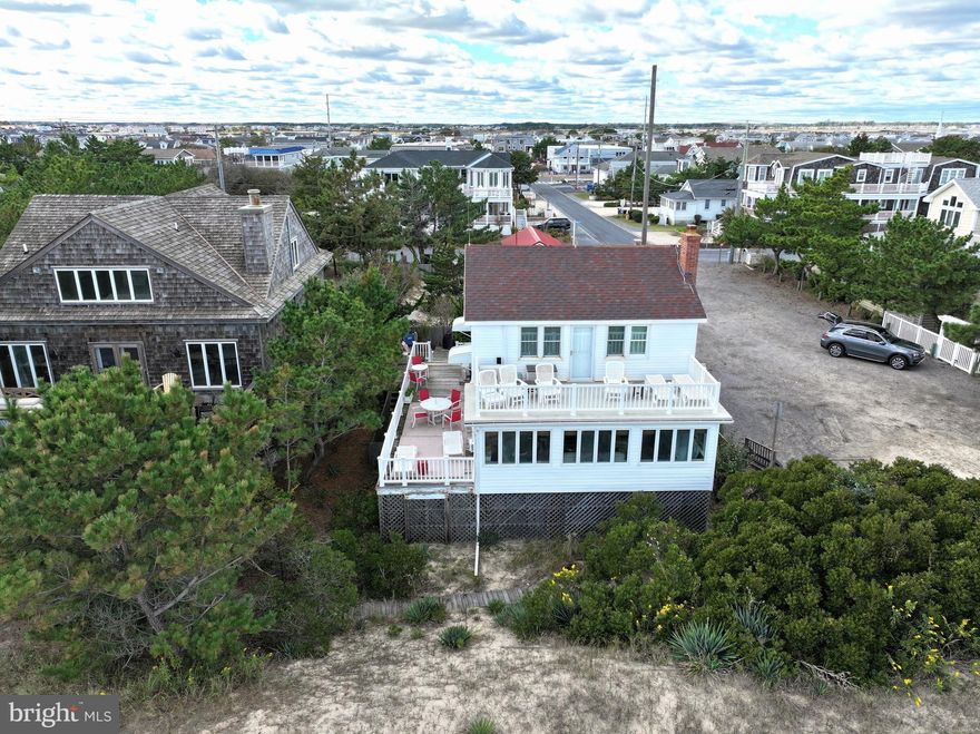 This fine cottage, built in the 1940's has been wonderfully maintained and cared for.  Classic beach style with beautiful knotty pine walls and ceiling in the main living area.  The home has been a wonderful rental for many years with repeat renters returning year after year. Plenty of room inside, especially so for a cottage of this age.  Mini-splits provide a/c with electric heat as well. Open decks off both levels some allowing a bit of shade and others plenty of direct sunshine.  
The lot size is 50' x 150' with a detached garage.  Large stone driveway for off-street parking too. 
Prime location on the South East Corner of Bunting Avenue and Cannon Street, direct ocean front, right in the heart of the wonderful town of Fenwick Island.
Please note: Sellers would love to be able to remove the knotty pine from inside the home if and when the buyer(s) decide to demolish the home and rebuild.
