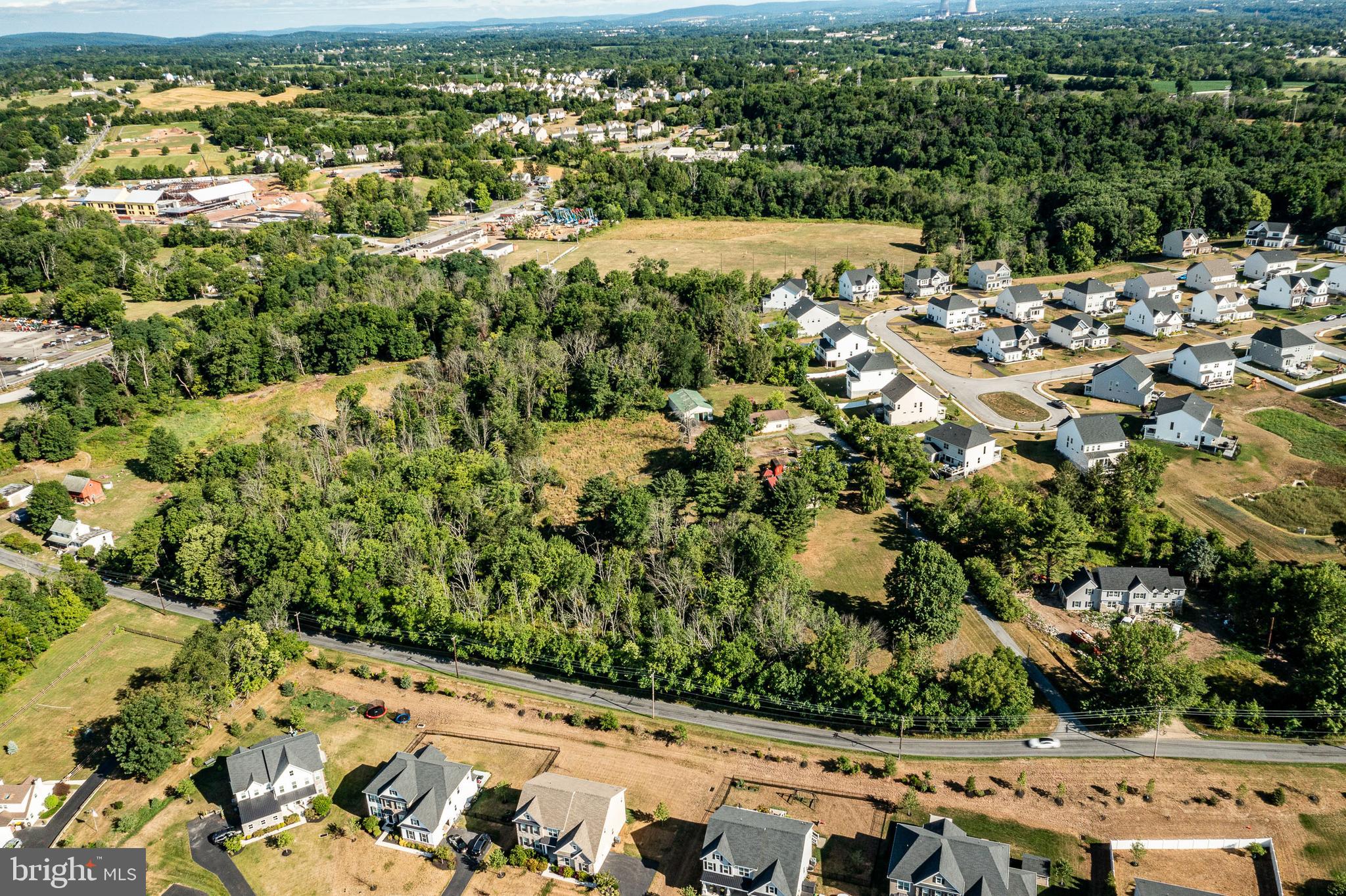 Location, Location, Location! Mostly wooded lots. East Pikeland township 10.13 acres on two parcels being sold together. 1023 Snyder is 9.2 +/- acres and 1029 Snyder is 1.052 acres. Currently great taxes of 4400.00+/- per clean and green tax status. The value is in the Land. Single ranch home on one parcel and a pole barn and cinder block garage with large door along with other sheds and out buildings on the larger lot. Home will be shown on second visit. Showing agent to be present for all showings. Do not walk property or enter driveway without an appointment. Please consult with township and other utility suppliers for any questions for your due diligence. Parts of the property are adjacent to Kimberton Glen. Build your dream home or subdivide! Property is currently in Act 319 Clean and Green. 9.2 +/- acre lot is zoned Mixed use and R1. Info attached on both. 1.052 +/- acre lot is part of R1 Zoning.