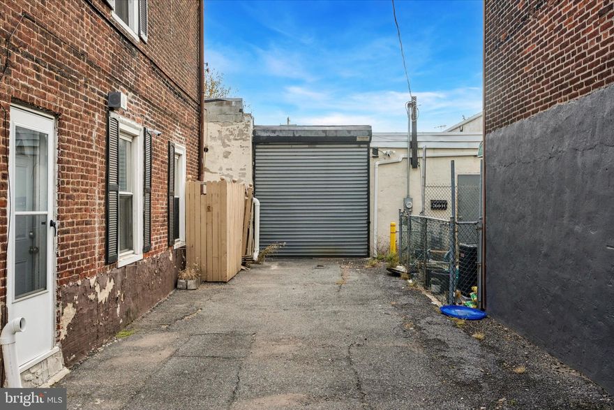 Unlock the potential of 3605 Salmon Street, a versatile commercial lease opportunity in the heart of Port Richmond—one of Philadelphia’s most rapidly evolving industrial-meets-creative corridors. This expansive property delivers the space, flexibility, and accessibility today’s businesses need to operate efficiently and scale with confidence. Step inside and take advantage of approximately 6,300/SF of interior space, featuring 14-foot ceilings and an open layout that accommodates a wide range of uses. From contractors, builders, and fabricators to architects, designers, and artists seeking studio or production space, this property adapts to your vision. The property boasts two separate driveways leading to individual garage bays, perfect for loading, receiving, vehicle access, or secure storage. These bays offer flexible leasing options: each bay can be leased individually for $3,500/month + NNN, or the entire space can be taken as a single unit for $7,000/month + NNN. Whether you need one dedicated workspace or the full property for a growing operation, the layout provides options to suit your business needs. Inside, elevated heating units keep the warehouse floor clear and usable, while a private office suite with heat and A/C provides a comfortable space for administrative tasks, meetings, or day-to-day management. A full bathroom is also included for added convenience. Set in Port Richmond, you’re surrounded by a mix of established trades, buzzing creative shops, and new businesses flocking to the neighborhood for its accessibility and industrial charm. Quick connections to I-95, Center City, and nearby riverfront corridors make this spot ideal for distribution, collaboration, and client access. 3605 Salmon Street gives your business room to build, create, store, or innovate—all in a location that keeps you connected and positioned for growth.