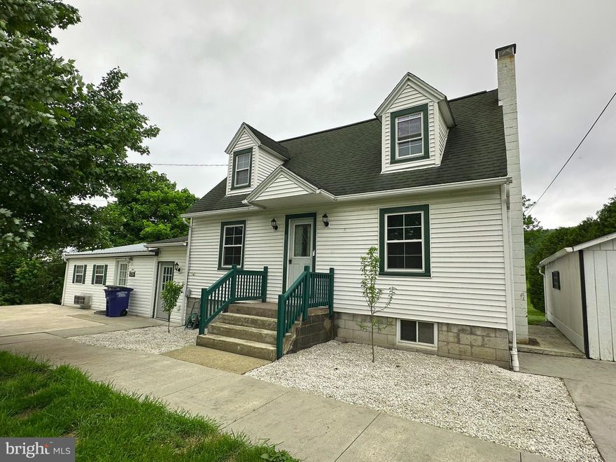 Spacious and updated cape cod in Snake Spring is awaiting its new owner! Smart home with various connectivity options makes this home efficient and modern. Countless updates throughout including a UV air treatment system with new heat pump. Main floor features a living area, dining room with smart thermostat, updated kitchen with luxury vinyl tile and beautiful quartz countertops, downstairs full bath and main floor bedroom or den. Walk through the breezeway to a spacious and versatile space with so many options for it's use. Opportunity for rental income! Use as an airbnb, guest suite or in-law quarters. Full kitchen, living area, studio style bedroom, sunroom and full bath. Upstairs you'll find the primary bedroom with electric fireplace and full en-suite bath as well as your 4th bedroom. Lovely private yard and 1-car garage or shed. This home needs nothing. It's as beautiful as it is functional! Set up your showing today.