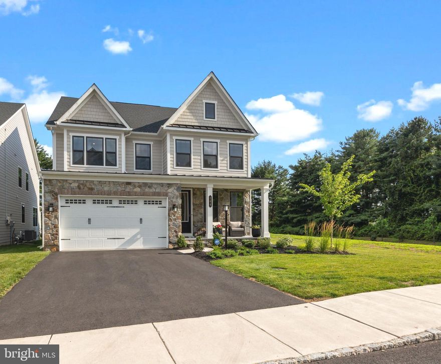 Just like New Construction without the wait! Looking for a move-in ready single-family home with fresh updates, modern floor plan, new mechanicals/systems while enjoying the comforts of Newtown? Then look no further! This beautiful 1-year young home is the perfect blend of comfort, style, and convenience and is situated on a premium lot with a side yard of open space and backing to the woods within the highly desired Council Rock School district. Step inside to find spacious, light-filled rooms, an open layout with upscale, modern finishes, and inviting living areas ideal for everyday living or entertaining. Upstairs, the primary suite offers a spa-like bath and a walk-in closet with custom organizers. Two additional bedrooms each highlight a private bath. The Bonus loft space can be easily transformed into an additional 4th BEDROOM. A convenient upper-level laundry adds to the functionality of the home. The fully finished, walk-up lower level features a full bath and roughed-in plumbing for a future bar—perfect for entertaining or extended living space. Additional highlights include epoxy flooring in the garage, an exterior gas line for an outdoor grill, a reverse osmosis water filtration system, and a generator hook-up for added convenience and security. Located in the popular Mayfield community with dog park and playground, this home offers easy access to Newtown Borough shops, dining, and commuter routes. An incredible value listed $300k less than another new home community in the area!