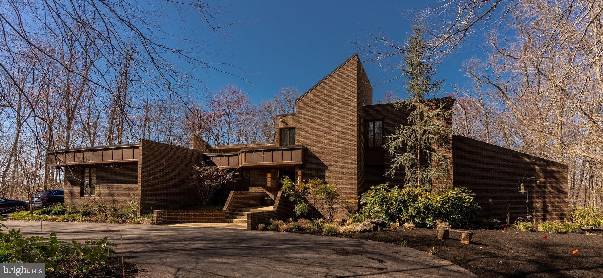 NEW PRICE 3/24. Privacy abounds at this updated contemporary home sighted on 2.34 acres of wooded property in Potomac. This five bedroom, four and a half bath home is full of natural light and has stunning views from all room. From the vaulted ceilings to the amazing chef's kitchen to the walk out lower level, this home is well suited for peaceful family living to large scale entertaining! The primary suite with its private deck, the expansive deck off of the kitchen and the generous patio around the pool, add to the gracious outdoor living spaces.
With easy access to Potomac Village, the area airports as well as Bethesda, this home is a must see.