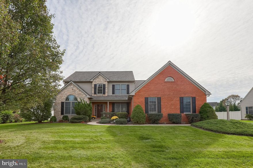 Spacious 6 bedroom home in Manheim Township schools with first floor master suite. Home features hardwood flooring, 2 story foyer, crown moldings and tray and cathedral ceilings. Eat in kitchen with granite, tile backsplash and recessed lighting. Two story family room with fireplace, first floor laundry room and newly finished lower level with bedroom and full bathroom. Rear patio leads to large, flat backyard and new HVAC and roof.