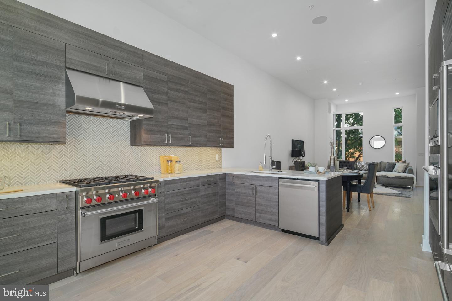 Live in opulence in the fully loaded home at Lippincott Alley. Lippincott is a premier living destination in the heart of Old City. Located next to the historic Arch Street Meeting House, the townhomes at Lippincott provide a sanctuary from the bustling pace of life in the city. Enter your front door from a quiet, brick-paved lane and step into a home that is refreshingly contemporary or enter from your 2-car GARAGE! Enjoy an open concept main level floor plan that is perfect for entertaining. Relax and unwind in the comfort of the living room. This light-filled space highlights the natural beauty of the surrounding landscape. Cooking won't feel like a chore in this gorgeous kitchen equipped with Wolf and Sub-Zero appliances, granite countertops, plenty of cabinets for storage and direct access to your private balcony. The second floor features two large bedrooms with custom walk-in closets. Each bedroom has its own bath - one with a tub/shower combo, the other with a glass-enclosed shower. A bonus feature of the space includes upper-level laundry with Whirlpool front loading washer and dryer. Pamper yourself in the master suite. Enjoy a generous walk-in closet with custom storage system and spa-like master bath featuring a double vanity, free-standing soaking tub, large glass-enclosed shower with multiple shower heads and rain shower plus tons of natural light. A private elevator whisks you up to the roof deck where you can enjoy the view and watch the fireworks at Penn's Landing. The pilot house is equipped with a wet bar, beverage center, open shelving and lounge area - plus a powder bath. Leave the car parked in your private two car garage. Enjoy the ease of being walking distance to the best of Old City - located just minutes from public transit, the city's best restaurants, boutique shops, art galleries and area attractions. Additional features of this 3-4 bedroom, 4 full and 2 powder bath home include include a finished basement, a full bath, flex space for a 4th bedroom and extra storage, gorgeous hardwood floors and tile throughout, high ceilings, and alarm system. Luxury living in one of the most historic locations in the US. What more could you ask for? Schedule a showing today. All square footage numbers are approximate and include above and below grade measurements. Tax abatement started in 2019.
