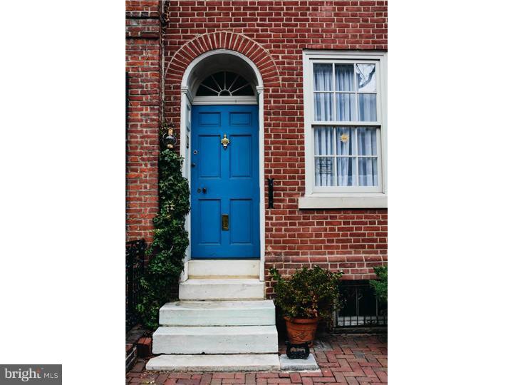 Elegant, spacious, light-filled, prime location and parking! This gracious and historic Joseph Wetherill 3+ bedroom Federal home, c 1805-1810, is located on the desirable 200 block of Delancey Street in the heart of Society Hill. It was lovingly and meticulously restored in the mid 1960s by its current owner, and its Federal character is accentuated by rich period details including crown moldings, original paneling and ceiling decoration, original wood floors, historically significant Robert Wellford mantels with Pennsylvania blue marble surrounds and an original center staircase. The first floor consists of an entry foyer, elegant, light-filled livingroom with an original Wellford mantel, a formal diningroom with another original Wellford mantel which has a design of the goddess Diana commanding her hound. There is a spacious eat-in kitchen with glass paneled doors to a sunroom overlooking the charming, brick garden. The second floor includes the master bedroom with a fireplace, a full bath in the hall and a nicely sized den/office. Two additional bedrooms (one with a fireplace) and a hall bath are on the third floor. The fourth level has two dormer rooms plus a skylight and cedar closet in the hall. The basement features a den/media/playroom with an exposed brick wall, wood beamed ceiling, powder room,a storage area with a washer/dryer and mechanicals. This magnificent home is ready for your personal updates and the deeded parking space is directly behind the garden in the gated 3rd Street lot. The space has an annual association fee of approximately $1,200. 243-C DELANCEY,ALSO FOR SALE (MLS# 6537894),COULD BE COMBINED WITH 241 DELANCEY to use as an AU-PERE SUITE, GUEST QUARTERS, OR INCOME PROPERTY.