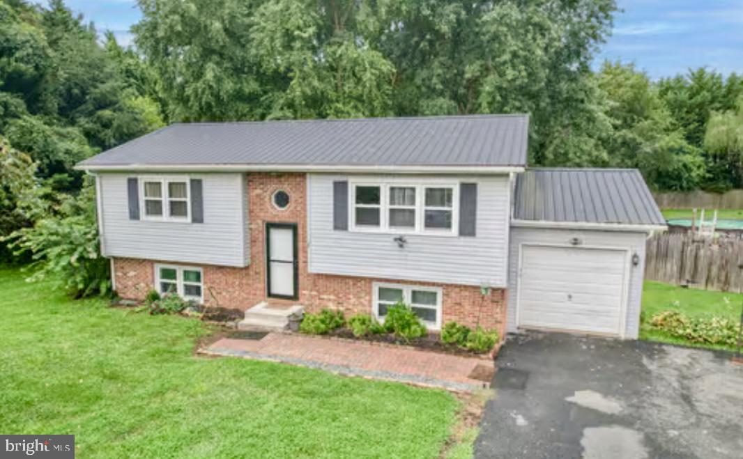 Welcome to this charming 3 bed, 1 bath home on a cul-de-sac with a spacious .78-acre lot, in the highly sought-after Brantwood community! This property has been thoughtfully updated and upgraded throughout the years, offering peace of mind and comfort from the moment you arrive.
Notable features include a metal roof (2019), new windows (2021), A/C & heat unit (2019), hot water heater (2020), and a new driveway (2021). Enjoy low-maintenance living with new seamless gutters (2021) and a new Trex deck (2024) perfect for relaxing or entertaining. The spacious kitchen boasts a new floor (2022), and a large shed (2019) offers ample storage for all your tools and toys. The partially finished basement offers flexible space for a home office, rec room, gym, or additional living area to fit your needs.
Step outside to a fully fenced backyard oasis with an above-ground pool, ideal for summer fun and family gatherings. With no HOA, you’ll have the freedom to truly make this space your own.
Located in Cecil County, you’re just minutes from fishing spots, scenic state parks, and vibrant waterfront restaurants. Whether you’re a nature lover, weekend adventurer, or simply looking for a move-in ready home, this one has it all.
Don’t miss your chance to own this Brantwood beauty! *Eligible for USDA 100% financing, subject to buyer qualification.