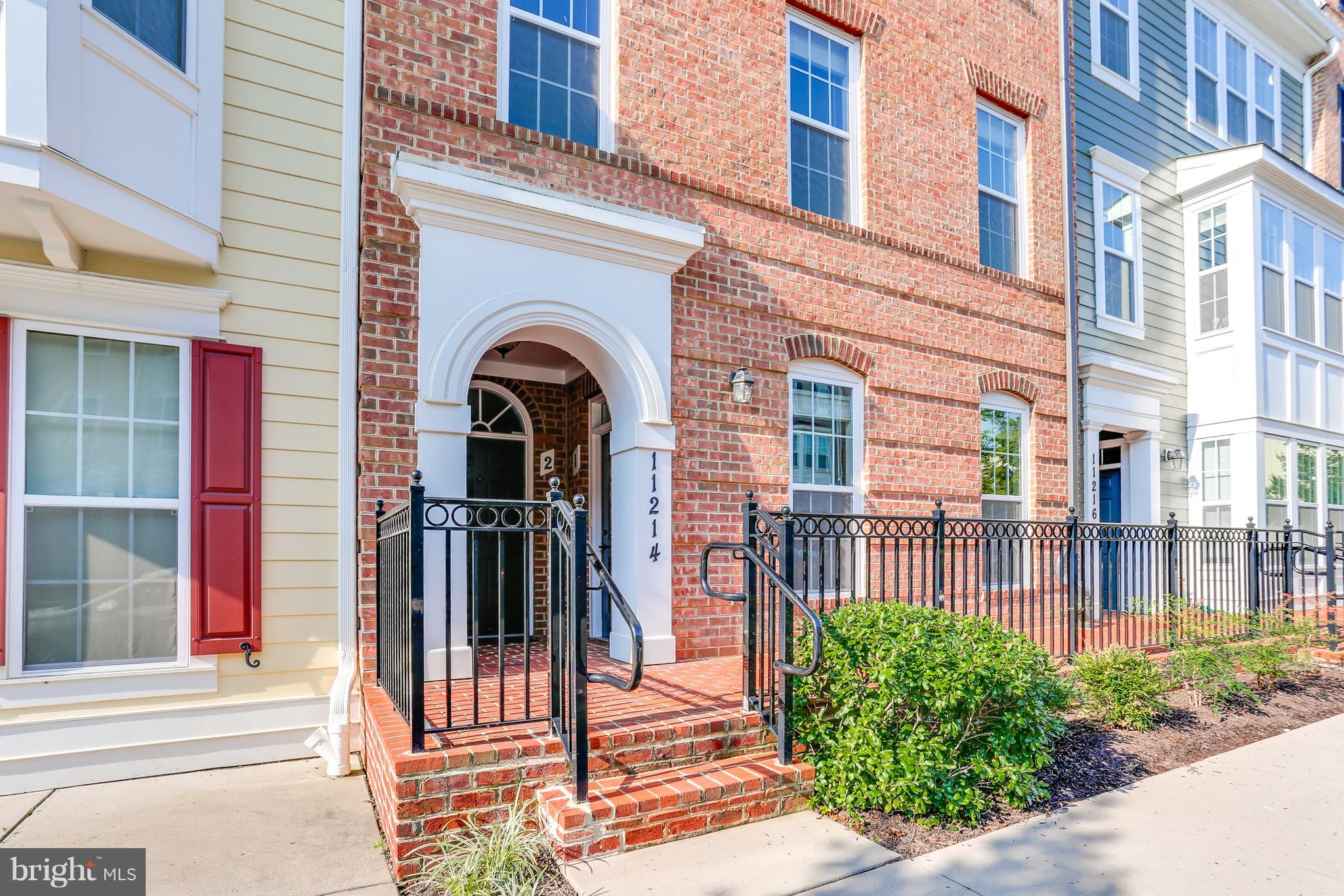 AMAZING LOCATION!! This two bedroom, two and a half bath Bozutto Red Maple condo is a block from the community center. Light filled and backing to spectacular views, enjoy all the amenities of the highly sought after community while enjoying this home filled with top of the line upgrades. Hardwood flooring on entire lower level, family room and living room, upgraded kitchen and baths and the perfect views of Maple Lawn! Come take a look today!!