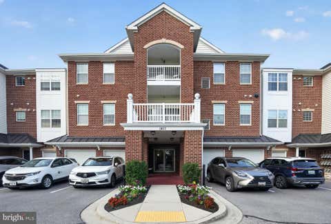 Photo of 1411 Wigeon Way #304, GAMBRILLS, MD 21054 (MLS # MDAA2155060)