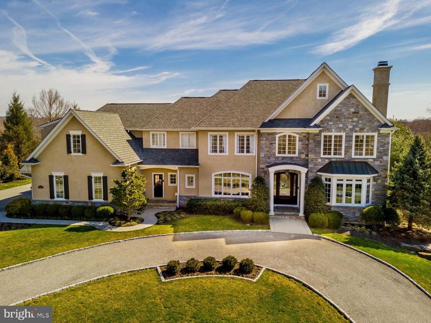 Superb craftsmanship and timeless architecture are unrivaled in this 8,000 sf Moser built estate home nestled on over an acre in the picturesque and prestigious Water Mill community. Sophisticated elegance and style meet the rural surroundings and convenient location with quality appointments throughout this impressive residence.  Extraordinary outdoor living & entertaining areas, easy to use AV systems, elaborate millwork, recess lighting with LEDs and extensive on site hardwood flooring are only the beginning.  A private lane leads to a welcoming circular driveway with meticulous landscaping and stunning front door entrance.  The grand center hall is flanked on the right by the living room with french doors leading to a study with custom built in bookcases with a relaxing sunroom behind; and on the left by the dining room with attractive moldings & butler's pantry. Custom chef's kitchen is the heart of the home with an abundance of glazed cabinetry, granite & limestone countertops with decorative tile backsplash, farmhouse sink, commercial grade appliances and a center island.  This inviting open floorplan is spacious yet intimate, providing a wonderful flow from the warmth of the kitchen & light filled breakfast room into the oversized family room with vaulted ceilings, fireplace and built in entertainment center. An organizational area, command center and two powder room's complete this Level. Retreat to the luxurious Owner's Suite with a dressing area & two walk-in closets with custom organizers. The spa like bath boasts his & hers vanities with limestone counters, a soaking tub, walk in tiled shower with body jets and a private water closet. There are four additional bedrooms: 2 bedroom suites with a private bath and 2 bedrooms that share a bath Jack n Jill style, upper floor laundry room with wash tub and folding counter and loft/reading nook complete the upper level. Spectacular finished walkout lower level offers another entertainment/gathering area with cherry floors, gas fireplace, custom bar, 600 bottle temperature controlled wine room, home gym, sound proof music room and 2nd laundry room. There are several private outdoor living spaces on the flagstone patios with an entrance from the main level of the house or the lower level.  Pick your perfect place for morning coffee, afternoon BBQ s, or just relax and enjoy watching a game on the outdoor TV under the pergola or listen to your favorite genre on the outdoor speakers.  The beautiful gunite pool is heated and has a waterfall and hot tub that is always the perfect aquamarine color! This striking setting is  enhanced by the pristine gardens and natural stone wall accents! This home has been meticulously maintained and is for the discriminating buyer who wants EVERYTHING conveniently located to the most sought after locations ...  Downtown Media, the Main Line, Center City, Philadelphia Airport & sports complexes.  Award winning Rose Tree Media schools along with some of the best private schools in the area which are in close proximity (Episcopal Academy & Baldwin).  Plenty of boutique shops, restaurants, Whole Foods Market & Starbucks are just mins away.  4 car garage, zoned HVAC (NEW furnace 2018), generator, irrigation System. PLUS   All appliances, window treatments, pool/patio furniture and planters, and AV equipment will remain with the house!  What more could you ask for?