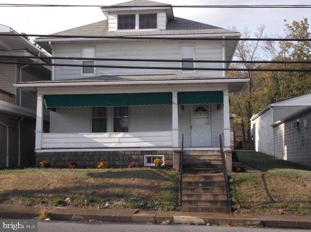 4 bed, first floor full bath and full bath on second level, new replacement windows, large front porch. 2 car garage with extra parking space located beside garage. First floor laundry with large closet.