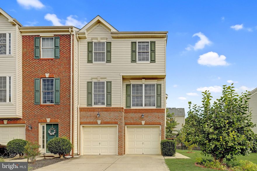 Welcome home! Don't miss this stunning 3 bedroom, 2.5 bath Claridge Lennar Model end unit townhome located in the highly sought after Independence subdivision in Manassas! This beautiful home will impress you. This home offers an open floor plan with many upgrades throughout the main level.  Main level offers hardwood floors, an eat in kitchen with beautiful cabinets, new granite countertops, an incredible backsplash and stainless steel appliances. The expansive dining area touts excellent natural lighting provided by a multitude of windows and a sliding glass doors that connects to a beautiful deck, not to mention the ambiance of a gas fireplace. The extremely large living room and sitting area combine for an excellent entertaining experience or transformed into a quiet rest area for those cozy evenings. The upper level touts hardwood flooring, a large primary bathroom with 2 walk in closets, large plush primary bath, two bedrooms, second bathroom and laundry. The fully finished lower level consists of a spacious room perfectly suited for a recreation room, theater room and/or game room and a rear walk-out entrance that lead to a lower level patio.  Perfect large two car garage. Great Location for transportation-Close to Route 66, 234 bypass, Routes 28 and 29. Quick drive to restaurants, shopping and entertainment.