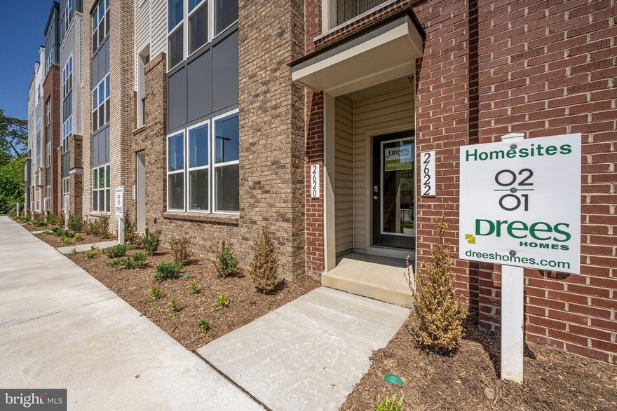 Step into modern sophistication with this stunning urban-style townhome condominium, where contemporary aesthetics seamlessly merge with functional elegance. This  end unit offers  2,319 square feet of living space, spread over two beautifully designed levels.

The heart of the home is the upgraded gourmet kitchen, featuring sleek stainless steel appliances, quartz countertops, and a generous walk-in pantry. Whether you're preparing a casual meal or hosting a lavish dinner, this space is designed for both convenience and style. Step outside to the expansive terrace—ideal for morning coffee or evening gatherings.

Upstairs, discover a thoughtfully planned layout with a versatile loft area, a dedicated laundry room, and two well-appointed secondary bedrooms that share a stylish hall bath. The owner's suite is a true retreat, boasting a spacious walk-in closet and a luxurious ensuite bath designed for ultimate relaxation.

To top it all off, a private rooftop terrace awaits—perfect for entertaining guests, unwinding after a long day, or simply enjoying the city skyline with your favorite beverage in hand. This townhome is a perfect blend of urban charm and modern comfort, offering a sophisticated living experience that feels both inviting and refined.