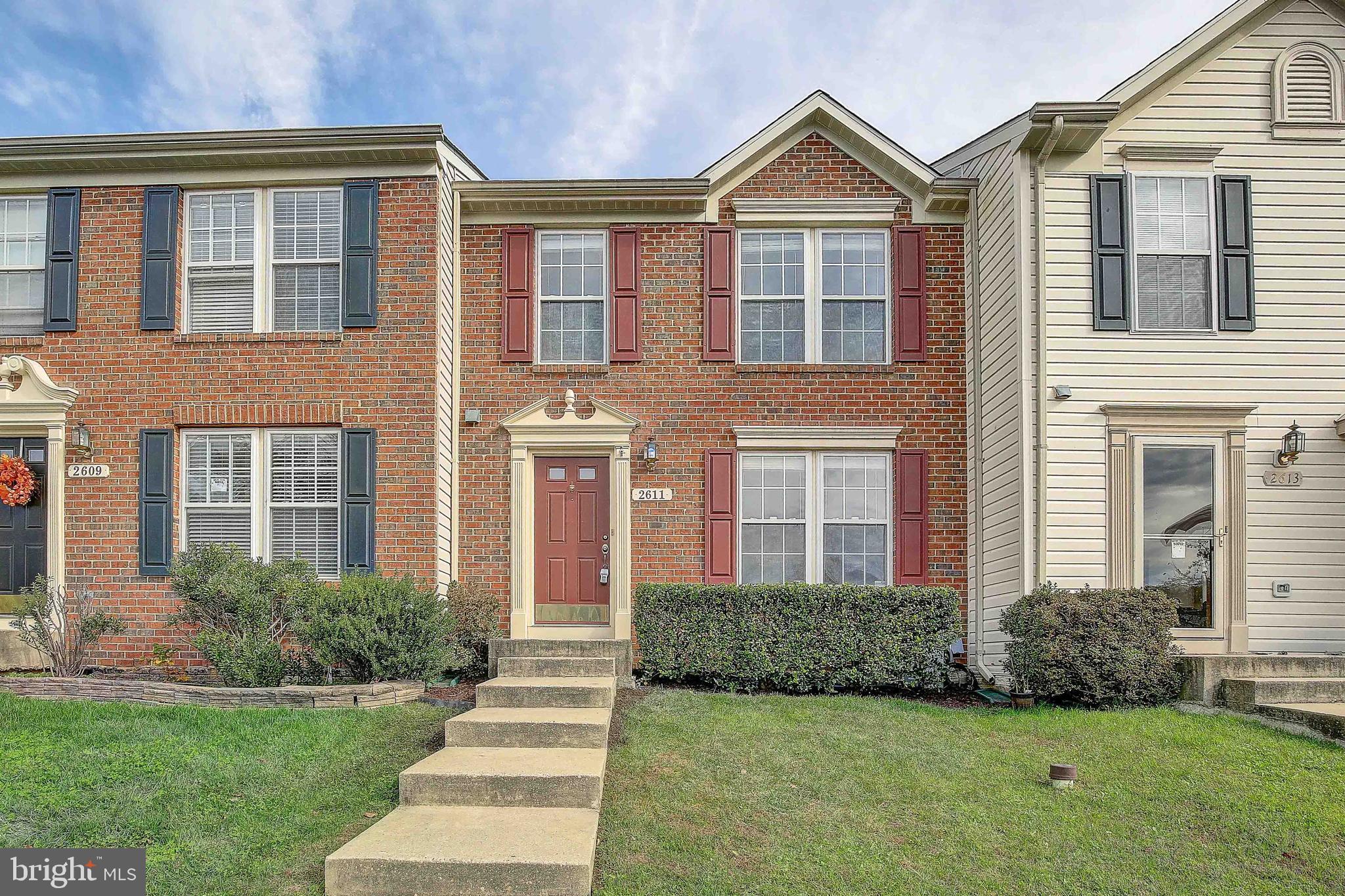 This lovely brick-front colonial is located in the heart of Piney Orchard, across the street from GORC park off Strawberry Lake Way where there are ballfields and playgrounds. You'll notice as you pull in, that this is an area where people take care of their yards and homes. You'll have your reserved parking spaces also and visitor spots are available as well. As you walk inside, you'll notice that the house has been freshened and prepared for you with fresh paint throughout and a pre-cleaning so all you need to do is pull up the moving truck! The layout of this home is idea with a large front living room leading to the kitchen in the rear. Your kitchen layout is perfect, nice and large with a moveable island that provides more cabinet and counter space. There is another large living area with the back bump-out which you can use for more dining, living or play space. There is a lot of natural light that comes in through the windows and the back sliding glass doors which lead out to the custom paver patio with rounded partial wall. Your yard is fenced on both sides so you can connect those if you'd like the back fenced also, otherwise it is open to a large common area - expands your outdoor living and play space. Upstairs is your large primary bedroom with it's own bathroom that features a large soaking tub with jacuzzi jets and a separate shower, and a huge walk-in closet. There's another full bathroom in the hallway outside of the other two bedrooms. The lower level recreation room has a huge laundry and storage area with your washer and dryer and a large recreation room which is extra spacious due to the back bumpout. Lovely home!