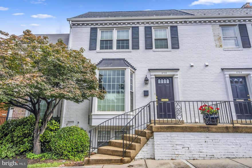 Located in a private court in the sought after Kings Manor community of McLean this 4 bedroom  3.5 bath townhome lives like a single family home.  The kitchen  with granite counter tops and eat in space has a large bay window overlooking the court.  The dining room opens to the large living room with a wood burning fireplace with built ins on either side and a wall of windows that opens to the large fenced patio space.  The upper level has three bedrooms including the Primary Suite with two closets with built in shelving and an ensuite bath.  A hall bathroom services the other two bedrooms on this floor.  Hardwoods on the main and upper levels  along with pull down stairs to a large and usable attic space.  The lower level  has a fourth bedroom and full bathroom, laundry room area and separate storage and utility room.  The large rec room has the second woodburning fireplace.  Ample parking  in front  and rear of the property.  The community has a beautiful park with a playground, basketball courts , pavillion and picnic tables and benches.  Kings Manor is conveniently located to the library and community center, downtown McLean, Tysons and the Silver Line Metro. Easily accessible to MD, DC and major airports.  Churchill/Cooper/Langley School District