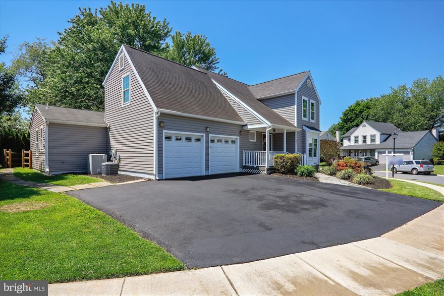 This meticulously designed and maintained home resides in the quiet and established Flower Hill Neighborhood. With nearly 5000 Sq. Ft. of living space, this forever-home is versatile enough for most any living situation, providing a main level in-law suite, 7 total bedrooms, 4.5 baths, 2 offices, an open floor plan, and more - all updated to perfection. The curbside presentation echoes the interior, with gorgeous landscaping, pristine vinyl siding, beveled glass doors, 2 decks, and a lovely front porch, maintained with pride of ownership. The home enters into an open concept main level with a bright and welcoming feel, elevated by a vaulted ceiling foyer. The gourmet kitchen is centered around a vast “L” shaped island complete with breakfast bar seating. The kitchen is finished with endless storage in floor-to-ceiling cherry cabinetry, a butler’s pantry with a coffee and wine bar, granite countertops, stainless steel appliances, a 5-burner gas range, and a double wall oven. A rear-facing 340+ Sq. Ft. composite deck accesses both the dining room and family room making it an entertainer’s delight. The main level in-law suite is composed of a large bedroom with pocket door family room access and an exterior exit. This separate living space also has an attached full bathroom (handicap accessible), walk-in closet, and shared laundry area. The upper level provides 4 bedrooms including a master bedroom suite. This suite has been made into a lavish retreat by combining with the 4th bedroom. It features vaulted ceilings, a large, private 350+ Sq. Ft. composite balcony, separate sitting room, generous walk-in closet, and luxurious attached bathroom featuring dual vanities, jacuzzi tub, and glass-enclosed shower finished with Travertine tile surround. 3 additional bedrooms are spacious, and the hall bath is updated with stone tile. The fully finished lower level provides abundant living space, spread out over 2 bedrooms, 1 full bath, a recreation room, craft room, and utility room. Whether you are looking for a home office, library, man cave, or simply guestrooms and storage, this lower level can suit any need. The two-car attached garage has an oversized 3-car wide driveway, plus an additional 225 Ft. of curb parking. Upgraded two zone HVAC, energy-efficient windows and doors, upgraded wall and attic insulation., gas fireplace in the family room, numerous upgraded pocket doors throughout. This home also lies in the perfect location, combining friendly and quiet suburban living with convenient access to surrounding amenities: easy access to 270 / 370 / 200, and the nearby Metro line can take one easily and swiftly into the greater D.C. region.