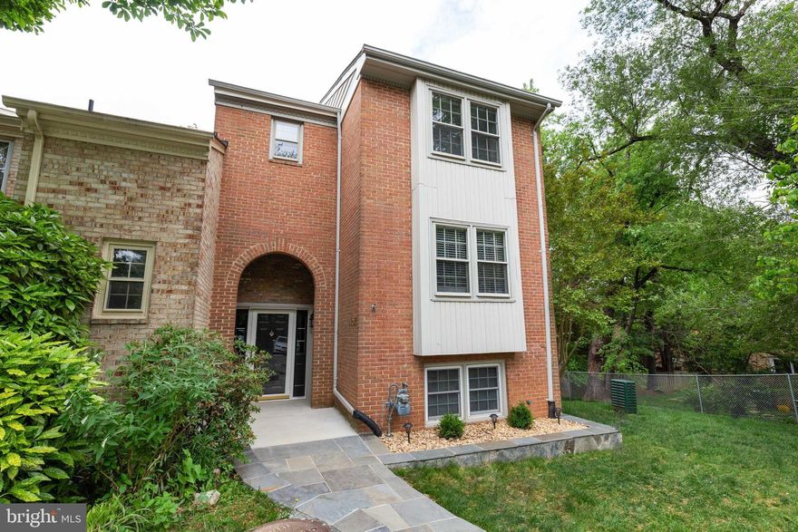 A great Brick End unit, 2313 Total Finished Sq Ft, in a great location with new stone retaining wall and walkway (2020). Sought after Mclean schools and close to everything.  4 Bedrooms/3.5 baths.  Kitchen appliances are stainless and newer, Gas furnace  and Water Heater (2012). NEW Roof (May 2020), new gutters, new capping.  Beautiful new high security front door and rear sound proof sliding glass doors (May 2020). Renovated lower level (2015) with new tile floors, brick fireplace and hearth, opening to large updated stone patio (2020).  New commercial size Washer/Dryer(2019). Enjoy being close to Metro, Mclean shops and restaurants, Tysons Corner and Falls Church Farmer's Market!  Large side yard, tucked away for privacy. Assigned parking space in front and across from a nice set of open parking for your additional cars and guests.  This is wonderful community living with  amenities onsite and nearby.  Community has acres of open space maintained by HOA, park areas w/benches and garden plots available to residents.  See Virtual tour, 3D Matterport, other photos and layouts/diagrams of each floor at links. Drop down ladder to Large Attic for Storage**During showing, no children permitted in property. Booties and gloves provided. No more than 2 Buyers in a showing. All parties are required to wear masks during the showing. First Showings JUNE 6.