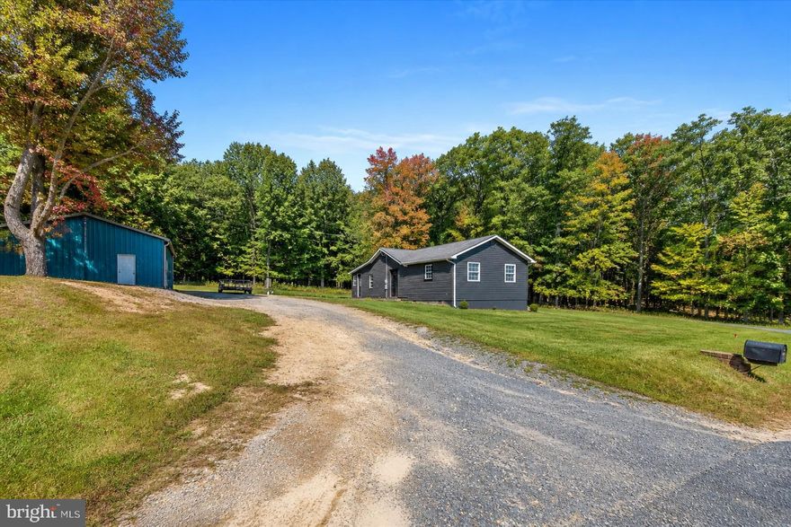 Ready to move to the country?!  This is your chance! A wonderful 3 bed / 1 bath rancher situated on an acre of Wild and Wonderful WV countryside.  What goes well with a house in the countryside? How about a MASSIVE multi-bay garage with tons of room for work and play.  Located minutes from Keyser, this property has it all!