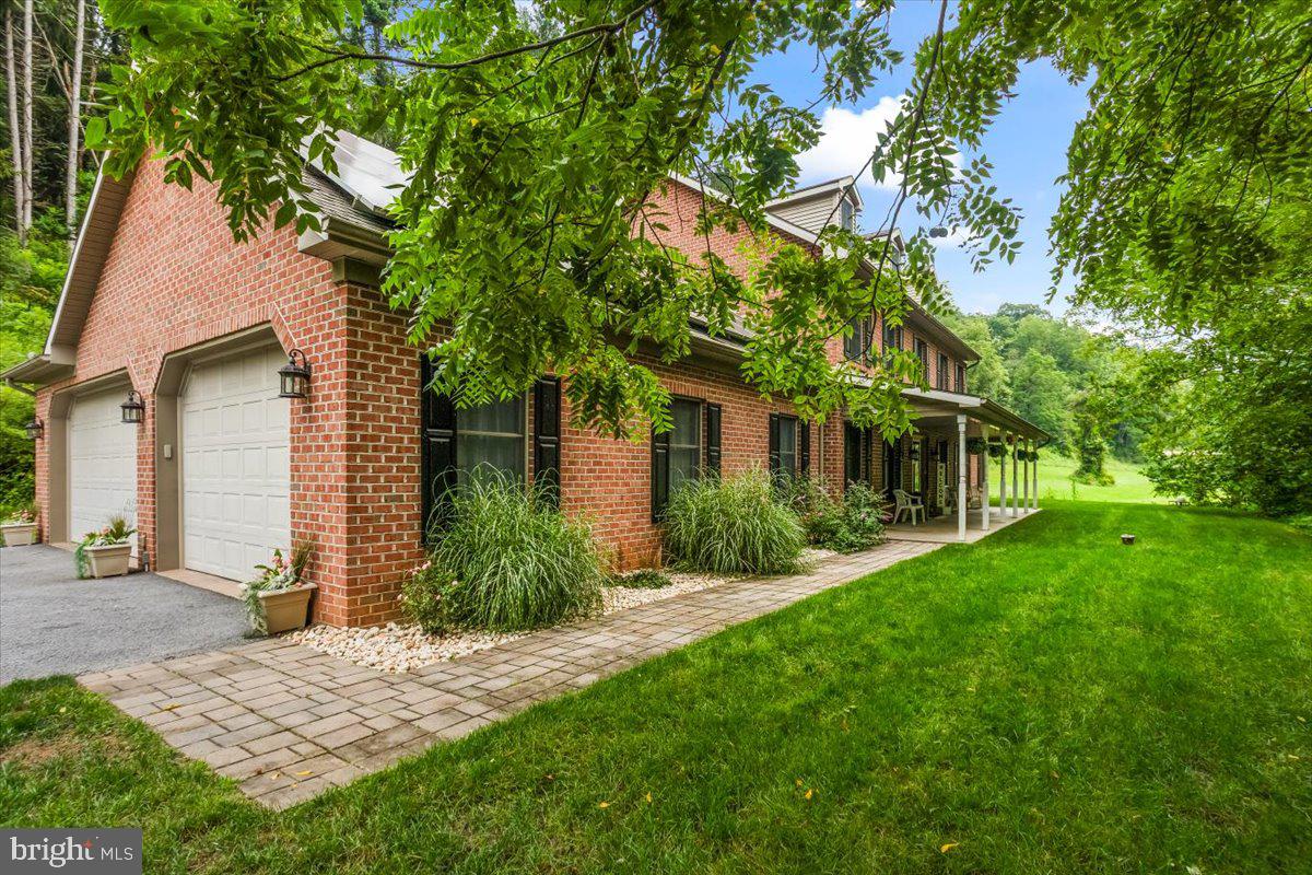Welcome to your peaceful countryside retreat on over 5 acres in Dallastown Schools! This beautifully maintained home offers the perfect blend of comfort, efficiency, and functionality—starting with geothermal heating and cooling, foam-blown insulation, and a whole-house generator for year-round peace of mind.
Inside, you'll find thoughtful upgrades throughout, including engineered hardwood floors, a first-floor office, and a convenient main-level laundry room. The great room, currently being used as a primary bedroom, features a cozy fireplace and offers a spacious, versatile layout to suit your needs.
The kitchen includes a pantry and comes fully equipped with appliances, while the adjacent dining area flows effortlessly for everyday living or entertaining. Upstairs, the true primary suite features a soaking tub, dual vanity, new tile flooring, and a custom walk-in closet with a pocket door.
An added bonus? A second parcel totaling 4.5 acres, zoned agricultural, giving you flexibility for future use—whether it's for gardening, recreation, or your own small farm dream.
This is the kind of home that balances space, comfort, and smart upgrades in a serene setting. Come experience it for yourself!