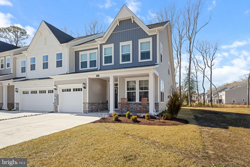 Coastal living meets comfort in this beautifully designed 4-bedroom, 3.5-bath end-unit Jefferson floorplan villa-style townhome in Milos Haven, offering low-maintenance living just minutes from Bethany Beach and Ocean City. With extra windows and natural light from its end-unit location, this home features a bright open-concept layout, perfect for everyday living and entertaining.

The main level showcases luxury vinyl plank flooring, vaulted ceilings, and a cozy fireplace in the living room, flowing seamlessly into the chef’s kitchen featuring stainless steel appliances, gas cooktop with hood, double wall ovens, built-in microwave, and a large center island.

The first-floor primary suite offers a tray ceiling, walk-in closet, and a private bath with dual shower heads, providing convenient main-level living.

Upstairs, you’ll find three additional bedrooms including a second primary suite, plus a spacious loft overlooking the main living area—ideal for a second living space, office, or guest retreat.

Enjoy the outdoors from your screened porch and patio backing to trees, offering privacy and a relaxing setting for morning coffee or evening gatherings. Additional features include a covered front porch, one-car attached garage, and an oversized driveway with parking for up to four vehicles.

Milos Haven offers low-maintenance living with community amenities including a swimming pool and walking trails, all while being conveniently located near beaches, golf, restaurants, and shopping.

Whether you're looking for a primary residence, vacation getaway, or coastal investment, this home delivers space, comfort, and a prime location near Delaware’s beautiful beaches.