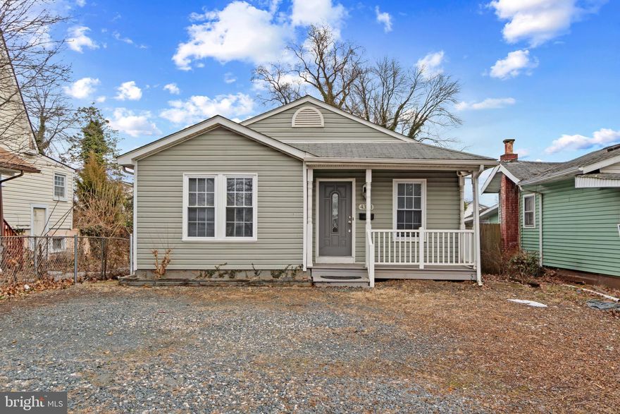Charming single-family residence offering 3 bedrooms, 2 full bathrooms, and 1,190 square feet in Baltimore Highlands. A welcoming front porch sets the tone as you step inside to the main level, where newly refinished floors and freshly painted walls create a bright, refreshed feel throughout. The spacious living room greets you upon entry, offering an inviting space to relax or gather with guests. Just off the living room is the generously sized, carpeted primary suite, complete with its own private en-suite bath for added convenience. Down the hall, you’ll find a convenient laundry closet, a linen closet, a full hall bathroom, and two additional well-sized bedrooms, offering flexibility for family, guests, or a home office. Continue into the dining room, beautifully enhanced with classic lower wainscoting detail and sliding glass doors that lead to the deck— perfect for outdoor dining or entertaining while overlooking the fully fenced backyard. The dining area flows seamlessly into the kitchen, which features stainless steel appliances, crisp white cabinetry, a pantry, and a statement light fixture.