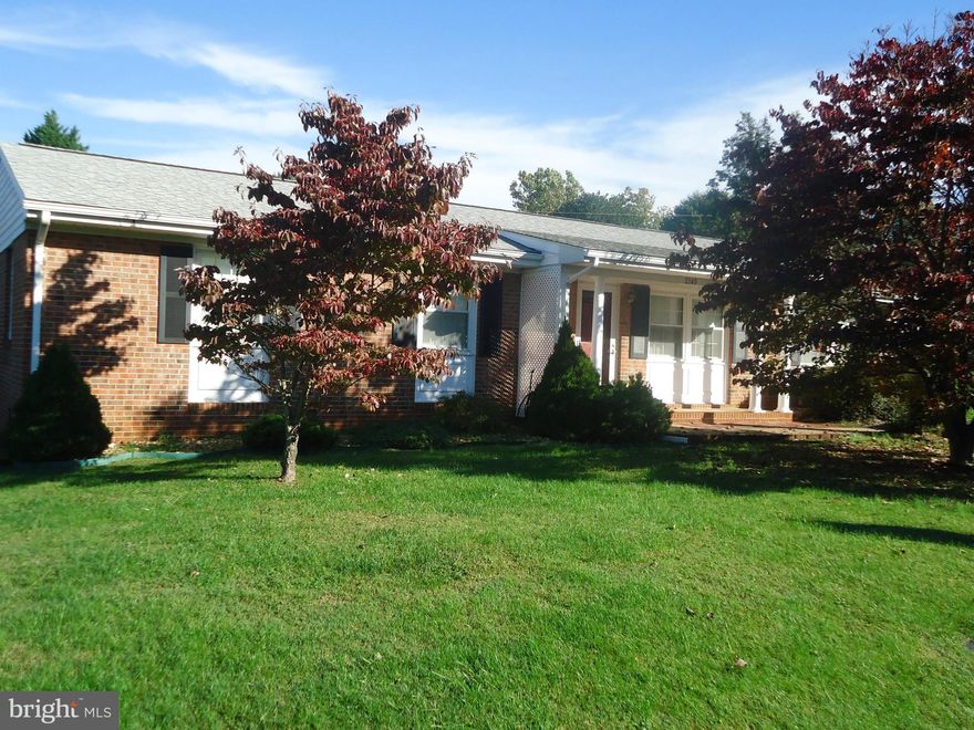 Popular location is a short distance to the hospital, shopping, & wellness center on the quiet south side of town. Ideal for first or last, nothing to do but move right in!  So much has been done: roof underlayment & shingles,soffits, gas furnace & A/C, hot water heater, total kitchen, appliances, baths, carpet, vinyl, interior & exterior doors, windows. Big, level yard is fenced in w/ rear deck.
