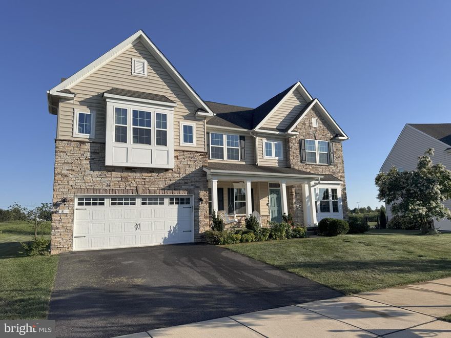 Welcome to one of the finest homes in the much sought-after Estates at Saint Annes. This beautiful 6-year-young, 5-bedroom, 3.5-bath Colonial with all the “bells and whistles” remains in excellent condition and has been meticulously maintained by the original owners. The stunning curb appeal is only a preview of the elegance and charm that await inside.

Step through the front door to a luxurious foyer with gleaming hardwood floors, high ceilings, and a thoughtful floor plan that blends formal entertaining with comfortable everyday living. The gourmet kitchen boasts granite countertops, stainless steel appliances, double wall over, a large island, large pantry, and abundant cabinetry, flowing seamlessly into the breakfast area and expansive family room with a cozy fireplace. A formal dining room and versatile living room/office provide space for hosting special occasions, while a private home office ensures convenience for remote work.

Upstairs, a beautiful and upgraded staircase leads to a spacious loft area, perfect for casual entertaining or quiet relaxation. The expansive primary suite offers a private retreat with a sitting area, two walk-in closets, and a beautiful bath with double vanities, a walk-in shower, and a private water closet. Three additional bedrooms, a full bath, and a convenient laundry room complete the upper level.

The finished basement extends your living options with a large 5th bedroom, a full bath with walk-in shower, and versatile areas ideal for a home theater, gym, additional family room, or recreation space.

Outside, enjoy nearly half an acre of landscaped grounds overlooking a beautiful fairway—perfect for outdoor living, gardening, or entertaining. The home also features an attached garage and ample driveway parking.

Located within the award-winning Appoquinimink School District, this home is close to shopping, dining, and major commuter routes, while still offering the seclusion and charm of a quiet neighborhood setting. The Estates at Saint Annes provides residents with a suite of lifestyle amenities, including access to a clubhouse and swimming pool. The community is beautifully situated alongside Saint Annes Golf Links, bringing golf into the neighborhood fabric, and also features walking trails and landscaped common areas that create a welcoming, vibrant environment for enjoying life.

This is a rare opportunity to own a spacious, move-in ready home in one of Middletown’s most sought-after communities. Don’t miss it — schedule your private showing today!