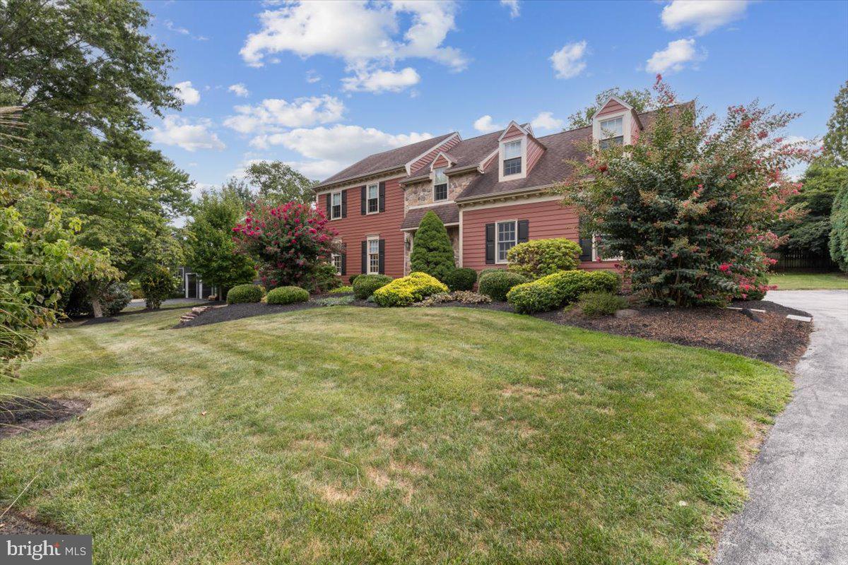 Nestled on a quiet cul-de-sac in the highly desirable Pawling Woods section of Phoenixville, this thoughtfully updated colonial combines classic elegance with modern style. Featuring 4 bedrooms, 2.5 baths and over 3,000 SF of living space surrounded by lush, professional landscaping, there is nothing to do but unpack your bags. Pride of ownership is evident as you approach the home; a freshly painted classic cedar exterior, and a winding slate walkway lead to the newly installed front entry. As you move toward the heart of the home, vaulted ceilings with exposed beams, skylights flooding the home with natural light and windows in all directions provide a sense of openness and connection to the outside. The updated chefs kitchen boasts soft-close cabinets with pull-outs, granite countertops, stainless steel appliances and a pantry for extra storage. An island provides additional workspace, storage and two seats to enjoy a glass of wine while making dinner! The kitchen is open to the family room and the adjacent breakfast area flows into a lovely sunroom. It’s the perfect spot for conversation, morning coffee or reading a book. Direct access to one of TWO slate patios from here makes it easy to enjoy the private yard. The large family room with vaulted ceiling and skylights is bathed in natural light. It is anchored by the dramatic two-story fieldstone fireplace with custom-made hardware. Access to a second patio from here provides flexible entertaining options. Imagine watching the Eagles this fall or enjoying family moving night by the fire. A formal dining room with new bay window offers views of the yard and a spacious living room offer multiple entertaining options! Gleaming hardwood flooring grace the entire main level. A powder room and laundry complete this level.
Heading upstairs, the primary suite is a spacious retreat. The recently updated primary bath, completed by Dillworth Custom Design boasts a walk-in glass shower, double vanity, and walk-in closet. There are 3 additional bedrooms, two of which have their own walk-in closets so there is ample storage for a growing family. New paint and brand-new carpet flow throughout this entire level of the home so it is fresh and ready for it’s new owners! A full bath completes the second floor. A finished lower level offers flexible options depending on your needs. There is a large home office big enough to accommodate two plus a versatile area for a playroom, theater room or home gym.
This home features meticulous updates, including Marvin Integrity windows and doors (2022 & 2016), new HVAC (2022 & 2018), remodeled primary bath (2018), hardwood flooring (2018), electric service panel (2021), basement remodel (2023), Generac whole home generator (2021), new carpet (2025) and paint (2025).
This meticulously maintained and thoughtfully updated home with private yard is ready for it’s new owners. The quiet setting in bucolic Schuylkill Township offers convenience, lifestyle, and location. Its only minutes to King of Prussia, downtown Phoenixville and on the edge of Valley Forge Park. Access to all the major routes including 422, 202 and I-76 is a breeze. Discover your next home at 60 Guilford Circle…Welcome Home!