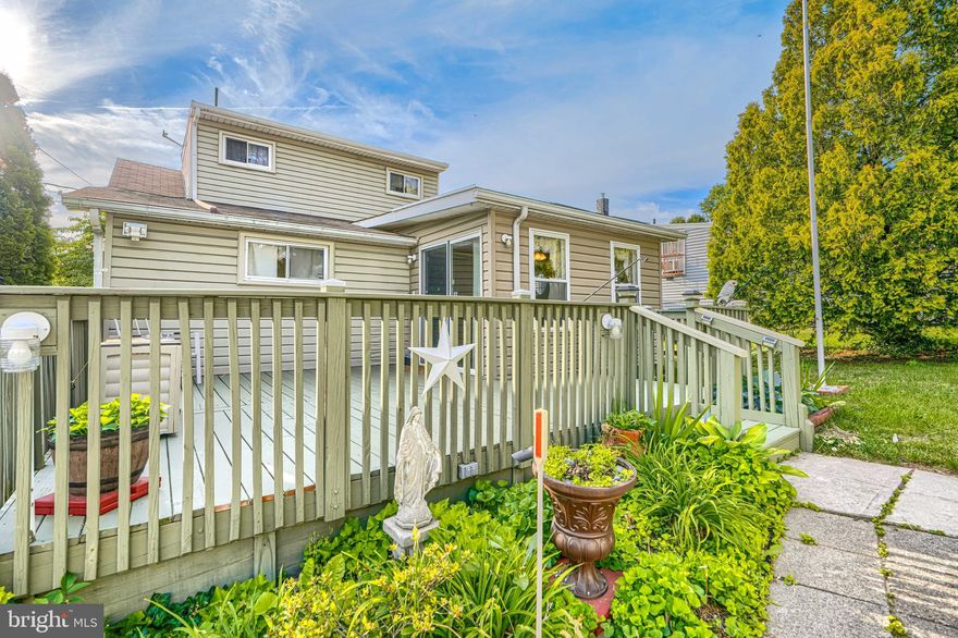 Charm and opportunity come together in this well‑maintained home. The main level welcomes you with a spacious living room/dining room combination, two comfortable bedrooms, an updated bath, and a large eat‑in kitchen that leads to a relaxing sunroom. The upper level offers a flexible primary suite option or can be divided into two rooms to suit your needs. The lower level features an updated HVAC system, newer water heater, and a waterproofing system - ideal for storage or future finished space. Step outside through the rear sliders to enjoy a generous deck, storage shed, and an oversized two‑car garage with electric. This home is being sold 'AS-IS', but it is solid, well cared for, and ready for your personal touch.