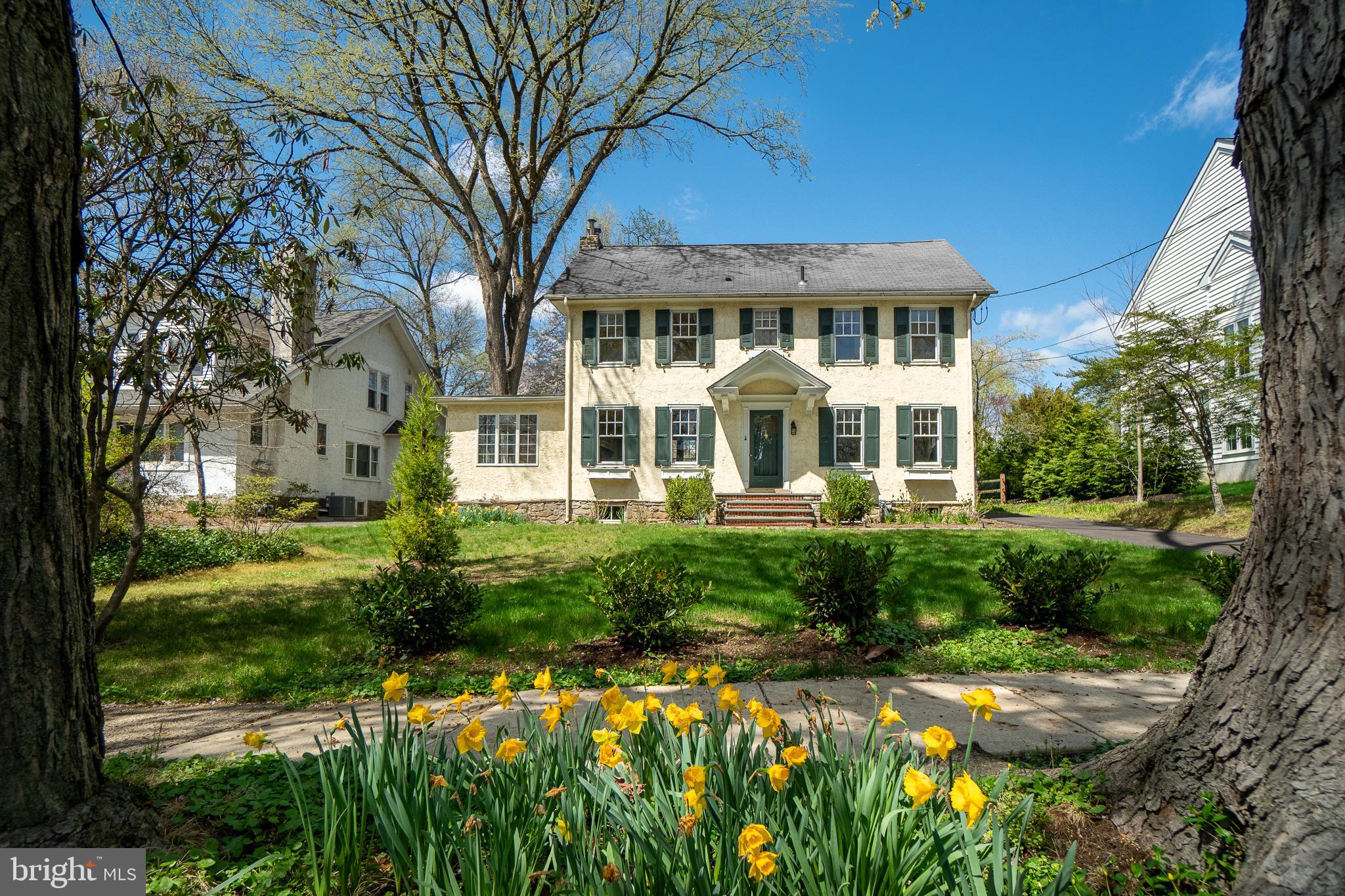 Lovingly restored 1920s four-bedroom stucco and stone colonial in sought-after Swarthmore borough; walkable to downtown village, SEPTA regional rail station, Swarthmore College campus, Swarthmore-Rutledge Elementary School, Swarthmore Swim Club, as well as Baltimore Pike shopping, Starbucks, Giant grocery store, etc. This single-family home features recently refurbished hardwood floors throughout (2020), new high-velocity central AC (2018), new custom built-in bookcases and millwork on the first floor (2020), new stainless-steel dishwasher and refrigerator, large LG washer & dryer with utility sink, and radiator heat powered by a recently installed natural gas boiler. The main full bathroom on the second floor was stripped to the studs and remodeled in 2022. The current owners installed a new street-to-house sewer and water piping, new windows throughout the basement, a new basement-to-second floor sewage piping stack, as well as structural reinforcements to the foundation. The private backyard is flanked by a new split-rail fence and plantings screen the perimeter with an enclosed kitchen garden and a large new masonry patio designed for outdoor entertainment. A detached single-car garage and unfinished 3rd floor attic provides ample additional storage space. The entire exterior stone foundation was expertly repointed in 2019 and a new flagstone pathway and front steps installed in 2020, along with a newly paved driveway (2024). This classic Swarthmore residence will not last long!