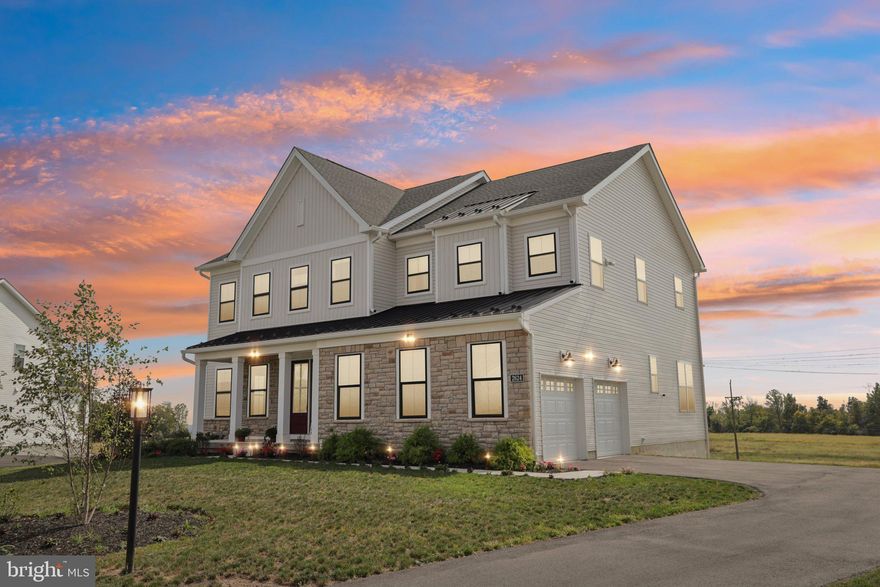 LOTS OF UPGRADES come with this 5-bedroom, 5-bath single-family home, in the highly sought-after Reserve at Center Square community in Worcester Township.  This home offers over 5,200 finished square feet of luxurious living on nearly a half acre Lot in Methacton School District.  Step inside to discover 10’ ceilings, beautiful upgraded luxury vinyl plank flooring, and full-height doors throughout the main level. The flexible floor plan includes a formal living room (could be used as dining room), a spacious family room with a gas fireplace, upgraded surround, wood mantle, and marble hearth, plus sliders to a custom 600 square foot composite deck with staircase to the rear yard with views of the open Farmland.  The gourmet kitchen is designed for both everyday living and entertaining, featuring expanded cabinetry with pull-out drawers, upgraded granite countertops and backsplash, 4 pendant lights over an oversized breakfast bar with seating for 6+, high end appliances including a 4-door refrigerator, wall oven and microwave, 5-burner gas cooktop with upgraded exterior venting, double Stainless Steel sink and convenient trash drawer. Just off the kitchen, access the two pantry closets, a double coat closet and 2-car garage with automatic openers with an electric car outlet . A main-level bedroom (or office) and a gorgeous full bath with shower stall complete the first floor.  Upstairs, the luxurious primary suite offers two walk-in closets, an ensuite bath with dual vanities, water closet, oversized shower, transom windows, and a large linen closet. Additional bedrooms, designed with comfort and convenience in mind, showcase a Jack & Jill suite with a double vanity and a separate tub/shower accented with subway tile, with one bedroom having hardwood flooring.  There is also a private ensuite bedroom featuring its own full bathroom with tub/shower having subway tile.  All upper secondary bedrooms feature walk-in closets. Conveniences include a 15x7 upper level laundry room with utility sink, tile flooring, and pull-down attic stairs.  The finished walk-out basement (38x24) boasts 9’ ceilings, recessed lighting, sliders to the rear yard, a full bath with tub/shower, and an abundance of unfinished storage space.  With countless upgrades throughout, this home combines elegance, function, and comfort in one of Montgomery County’s most desirable neighborhoods with walking trails and tranquil lake.  Conveniently located near Heebner Park, Zacharias Creek Trail, Merrymead Farm, Skippack Village, Evansburg State Park, Eagleville Park and many fine dining establishments.  Set up your appointment today and view the list of upgrades on this magnificent home!