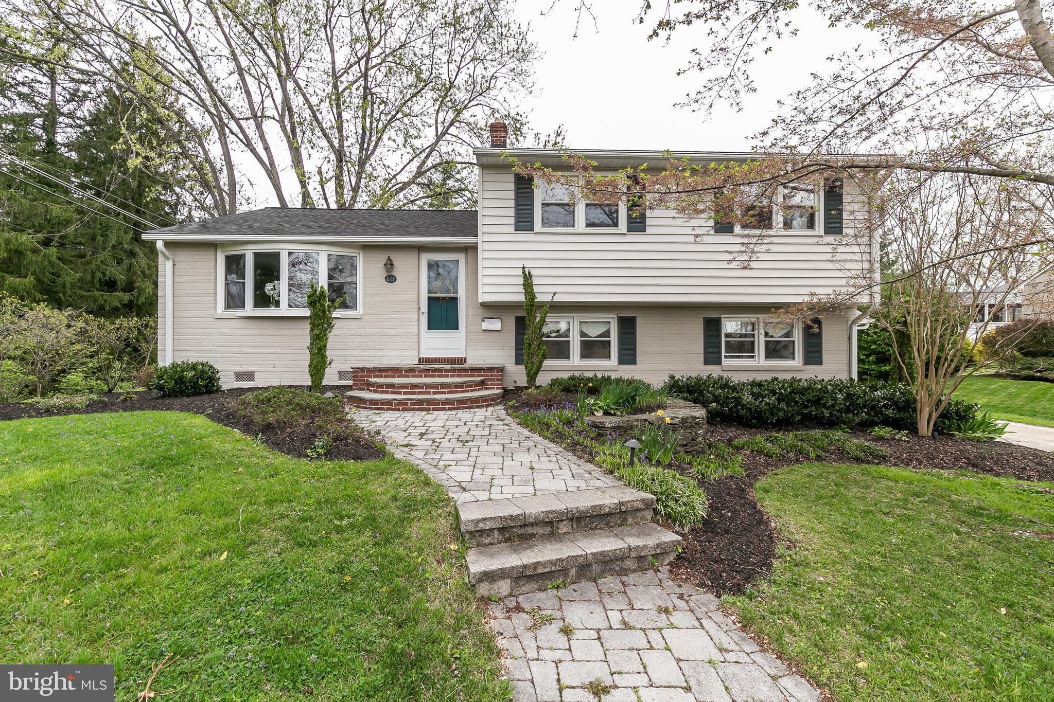 Outstanding fully remodeled split on gorgeous deep lot with stream. New open kitchen/dining room with large island opens to Trex deck. Hardwood floors throughout main and upper levels. Updated Baths. Large Family room on lower level with built-ins and walkout to back patio. Great neighborhood location!