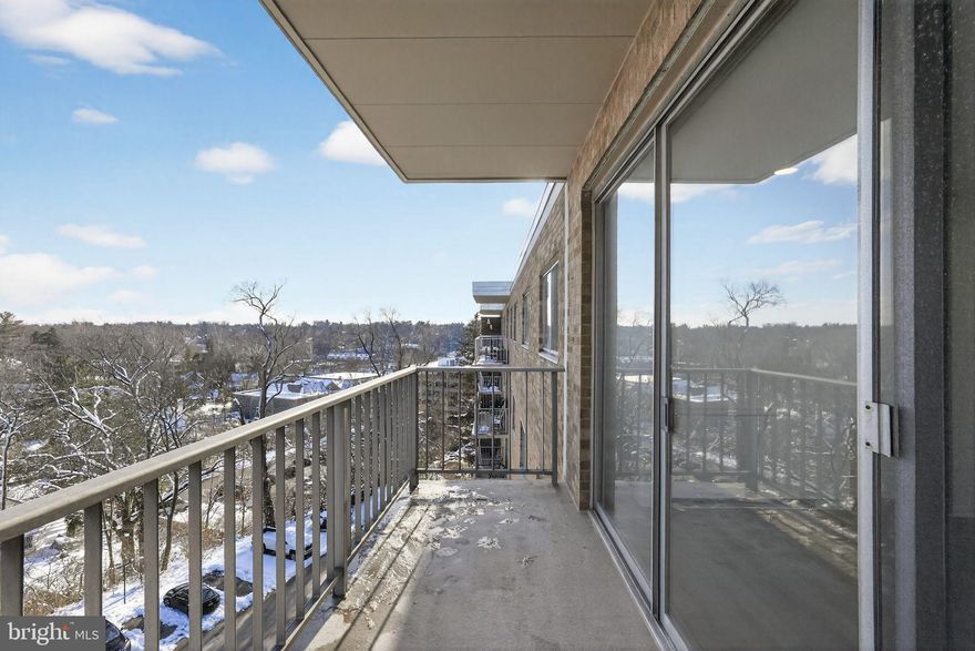 Nestled in the charming Jenkintown community, this mid-rise condominium at Beaver Hill offers a luxurious lifestyle that seamlessly blends comfort and elegance. With a major renovation completed in 2026, this residence boasts high-end features that elevate everyday living into an extraordinary experience. As you approach the building, the classic  exterior is complemented by beautifully maintained landscaping, featuring lush lawns and convenient awnings that invite you in. The property is equipped with modern conveniences, including a doorman and a welcoming lobby desk, ensuring a secure and inviting atmosphere for residents and guests alike. Step inside this meticulously designed unit, where an open layout maximizes space and natural light. The living area is anchored by an elegant electric fireplace, perfect for cozy evenings. The two spacious bedrooms and two full bathrooms are thoughtfully appointed, providing both privacy and comfort. The heart of this home is undoubtedly the balcony, where you can enjoy your morning coffee or unwind with a book while taking in the serene surroundings. The community amenities are equally impressive, featuring an outdoor in-ground pool,  and a community center that fosters a sense of belonging among residents. There is an additional charge for pool membership. For those who appreciate convenience, the property includes essential services such as air conditioning, electricity, and lawn maintenance, all covered by the association fee. The laundry facilities and guest suites add to the ease of living, while the nearby commuter rail station and airport ensure that travel is a breeze. This residence is not just a home; it's a lifestyle. With access to beautifully landscaped sidewalks and a vibrant community atmosphere, you'll find everything you need right at your doorstep. Whether you're enjoying a sunny day by the pool or hosting friends in your stylish living space, this property offers a perfect blend of luxury and comfort. Experience the exclusive lifestyle that awaits you in this beautifully renovated apartment at Beaver Hill, where every detail has been thoughtfully curated for your enjoyment. Don't miss the opportunity to make this exceptional residence your new home.  Trader Joes and Whole Foods are less then 2 miles away and the Jenkintown train station is within walking distance.