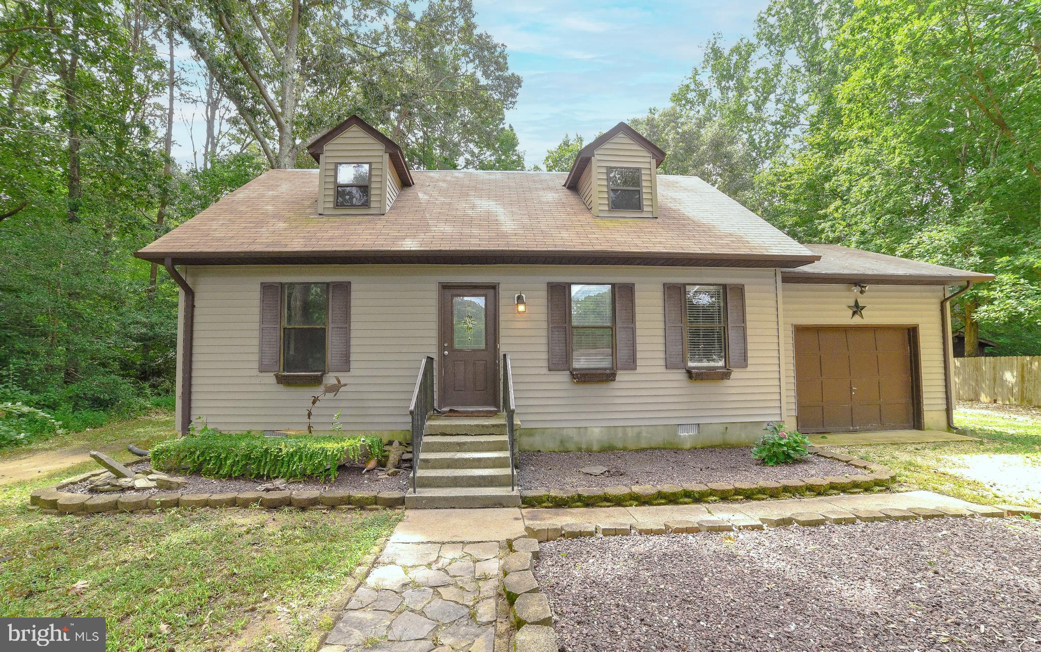 Great Rental, available 9/1/23. Beautiful lot located at the end of the cul-de-sac and backs to trees\State Park making it a very private yard. Home has updated kitchen and vinyl plank flooring. Great open floor plan between living room and kitchen with huge center island. Large owners suite is located on the main level with walk-in closet and bathroom. Upstairs are two more large bedrooms as well as another full bath. Out back you will find a great deck with a hot tub! 1 car attached garage too. Washer & Dryer included. No HOA! Great quiet, park-like setting yet very convenient location!