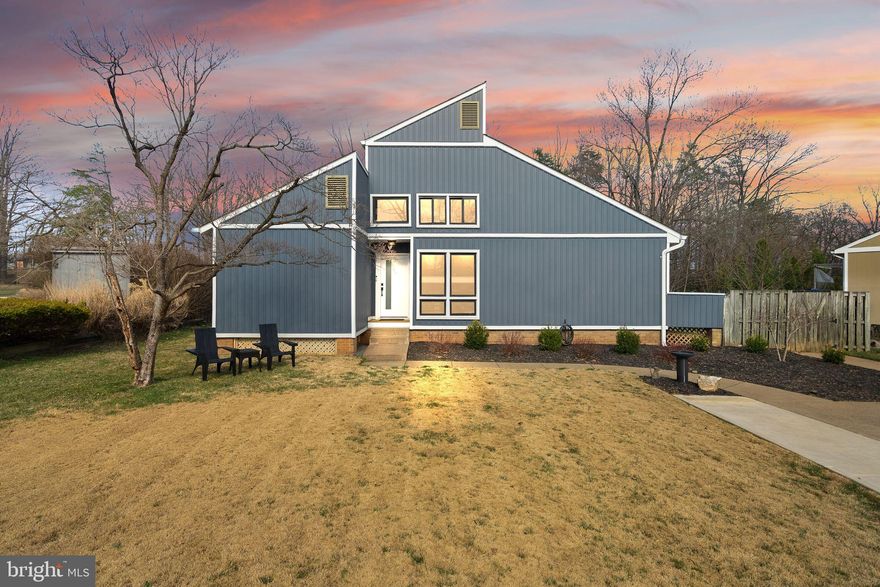 Welcome to 5513 West Cliff — a beautifully remodeled and thoughtfully upgraded mid-century modern home in the Lake Braddock community, offering 5 bedrooms, 4 bathrooms, and 3,000+ square feet of stylish, functional living. Renovated in 2023, this home nails the open-concept vibe with beamed ceilings, tons of natural light, and modern finishes that feel clean, current, and cohesive.
Right away, you’ll notice the exterior improvements that add both curb appeal and everyday convenience: the driveway has been widened and repaved, and fresh landscaping completes the look. Inside, the main level is designed for easy living and entertaining with an open kitchen, dining area, and family room that flow together beautifully. The main-level flooring has been updated to match the rest of the level, creating a seamless, polished feel throughout. You’ll also love having a main-level ensuite with a private bath, ideal for guests, in-laws, or anyone who prefers main-level living, plus two additional bedrooms and a full bath on this level.
The kitchen is a standout with a large center island topped with quartz countertops, stylish pendant lighting, custom cabinetry, and stainless steel appliances—perfect for everything from weeknight dinners to hosting friends. Throughout the home you’ll find updated finishes and durable LVP flooring, keeping the look modern while still being easy to maintain.
Upstairs, the primary suite feels like a private retreat with its own balcony and a luxurious, modern ensuite featuring dual vanities, quartz counters, and a spa-like shower. Storage is a major bonus here too: the closets have been upgraded with custom built-ins, making organization effortless. The laundry room has also been updated, adding both style and practicality where it matters most.
Downstairs, the lower level expands your living space even more with a large rec room, two bonus rooms, a full bath, and plenty of storage—perfect for a home office setup, gym space, hobby rooms, or additional guest flexibility. Out back, enjoy a new large deck that’s made for entertaining, all within a private fenced yard.
This location is the cherry on top—walkable to the Lake Braddock trail, commuter-friendly, and convenient to the Burke VRE. If you’re looking for a move-in-ready home with modern style, great space, and meaningful upgrades inside and out, 5513 West Cliff is a must-see.