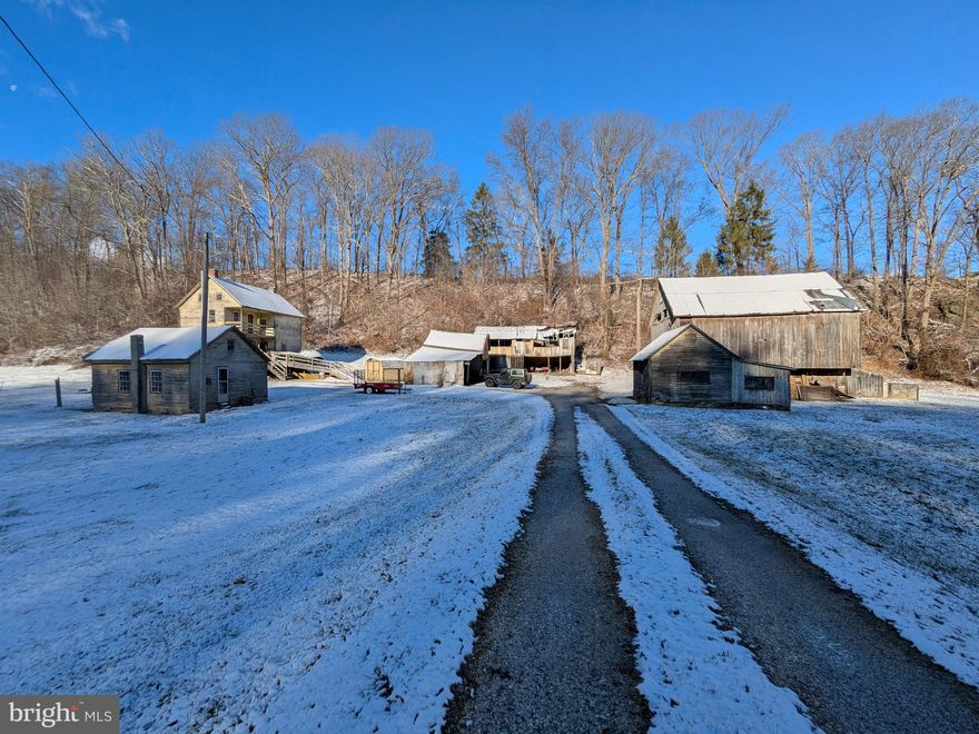 Back to active due to buyer backing out .

Nestled in a serene setting, this 14-acre property offers endless possibilities for your vision. The land features a small creek that winds through the landscape, adding charm and natural appeal. Approximately 10 acres are farmable, making it ideal for agricultural pursuits or creating your dream homestead. Stickly as is !
The property includes a farmhouse and several additional buildings, all of which are in need of demolition. This is a blank slate for those with the imagination to build new while taking full advantage of the land's beauty and potential. 
Please note this is an estate sale, and the executor has limited knowledge of the property's history or condition.