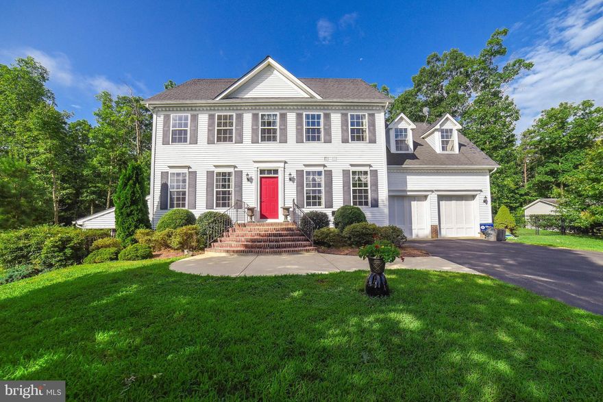 Welcome Home to this 4 Story Grande Colonial, move in ready 5 bdrm/4.5 bath. Spacious and bright open flowing floorplan. Large master bedroom suite.Office with wetbar and cabinetry. Large Bedrooms. Huge space. there is no shortage on Square footage. Large back yard and deck for entertaining and a peaceful retreat. Bonus Bedroom and additional room for an office or suite on the 4th floor.