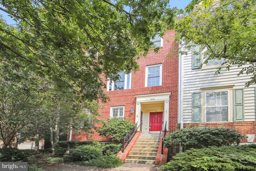 Fabulous unit in Old Town Greens is sparkling and move in ready.  This bright and sunny 3 bedroom 2 1/2 bath duplex is located on the upper 2 levels and also offers a 1 car garage.  It will wow you with an updated gourmet kitchen and a versatile space off of it with a gas fireplace that could be used as a dining area or casual sitting room.  The front room makes an inviting living room along with possible dining space.  As you ascend the stairs to the upper level you will find a convenient half bath.  The upper level offers 3 generous sized bedrooms- 2 with carpet and one with wood floors and wonderful built-ins.  The primary bath has been thoughtfully updated with two vanities and beautiful walk-in shower.   The washer dryer is conveniently located on the bedroom level as well. The location is outstanding being situated near community amenities-like the community pool, restaurants off of Slaters Lane and the bike path.  You can also walk  in to Old Town and to the new Potomac Yards Metro station.