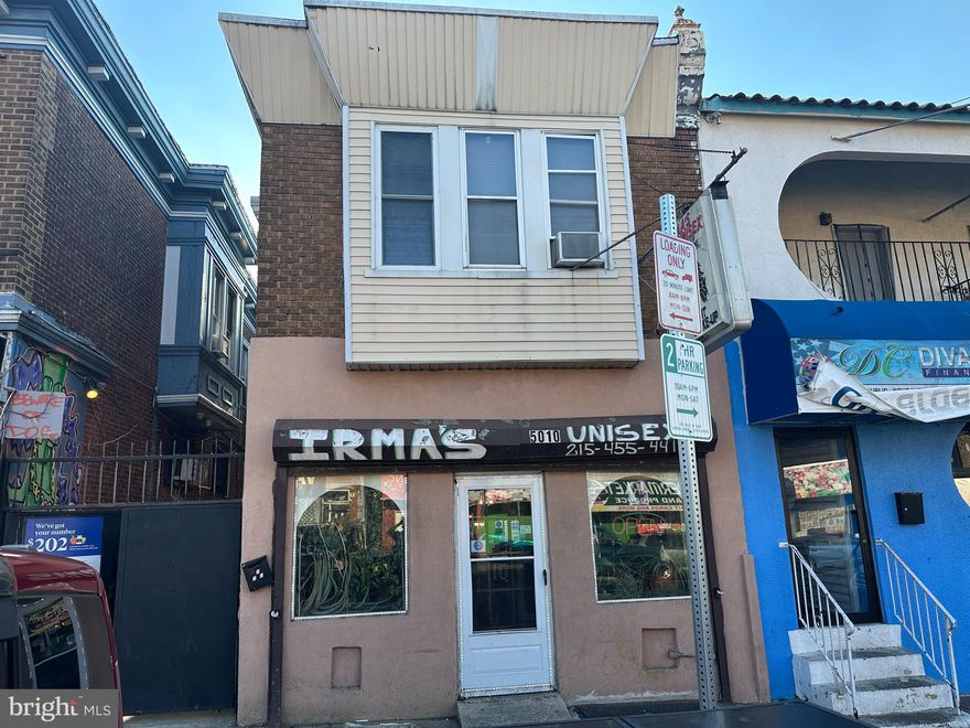 Check out this Turn Key Commercial Mixed Use Property on Busy 5th St Shopping District with a vacant store front and 2 occupied units.  
First Floor was a successful Hair Salon for many years and now its time for owner to retire.  All equipment and supplies are included in the sale.  Salon has a waiting area, 7 stations, a powder room and a Kitchen in the back with access to the full basement.  
The 2nd floor is a 3 bedroom apartment occupied by a long time tenant and has access to the rear roof and could be ideal for extra outdoor space.  The first Fl rear is a studio apartment also occupied by a long term tenant.  
The Basement is very large and has all separate utilities and all mechanicals are in good working order.
The Rear can be accessed from the gate in the front and there is a door in the rear to access the two apartments.  In the rear yard there is a garage that is used for storage only.  Overall this is a great mixed use property ready for you!