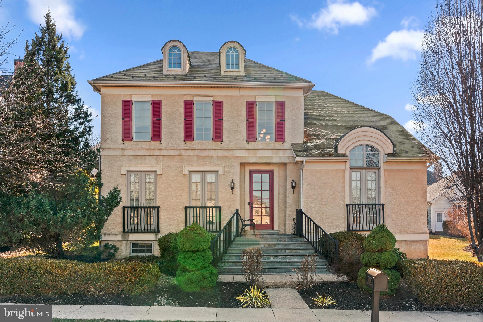 Welcome to this exceptional four-bedroom, three-and-a-half-bath home in the sought-after Woodmont community of Huntingdon Valley. Thoughtfully designed and meticulously maintained, this residence offers a blend of elegance, comfort, and modern conveniences—perfect for today’s lifestyle.
As you approach the home, bluestone steps lead you to the inviting entrance, surrounded by beautifully manicured landscaping. Step into the grand two-story foyer, where gleaming hardwood floors and soaring ceilings set the stage for the sophisticated interiors.
To the left, a private home office features crown molding, recessed lighting, and hardwood floors, providing an ideal workspace. On the right, the formal dining room boasts vaulted ceilings, wainscoting, crown molding, and rich hardwood flooring, creating a stunning setting for entertaining.
The heart of the home is the spacious gourmet kitchen, equipped with wood cabinetry, granite countertops, a center island, stainless steel appliances, a pantry closet, and a Viking six-burner range stove. A double-sided gas fireplace connects the kitchen to the cozy family room, where vaulted ceilings and a gas fireplace enhance the inviting atmosphere. From here, step outside to the composite side deck, a perfect spot for outdoor dining and relaxation during warmer months.
The main level also features a luxurious primary suite—your own private oasis. The bedroom showcases hardwood floors, a tray ceiling, and a large walk-in closet. The ensuite bath is designed for ultimate comfort, featuring a Jacuzzi tub, two oversized vanities, tile flooring, a stall shower, a water closet, and a linen closet. Completing this level is a convenient powder room, a well-appointed laundry room with tile floors, cabinetry, and a utility sink, along with direct access to the attached two-car garage.
Upstairs, you’ll find two spacious bedrooms, each offering ample closet space and access to a well-appointed Jack-and-Jill bathroom.
The finished basement is an entertainer’s dream! Currently designed with a wet bar, pool table area, and a comfortable sitting room, this space is perfect for hosting gatherings. Additionally, there is a room currently being used as a gym, which could serve as a guest room, plus a fourth bedroom with a walk-in closet and a full bathroom—ideal for extended family or visitors.
Located in a prestigious community, convenient access to shopping, dining, and parks, this move-in-ready home offers everything you could want in a prime Huntingdon Valley location.