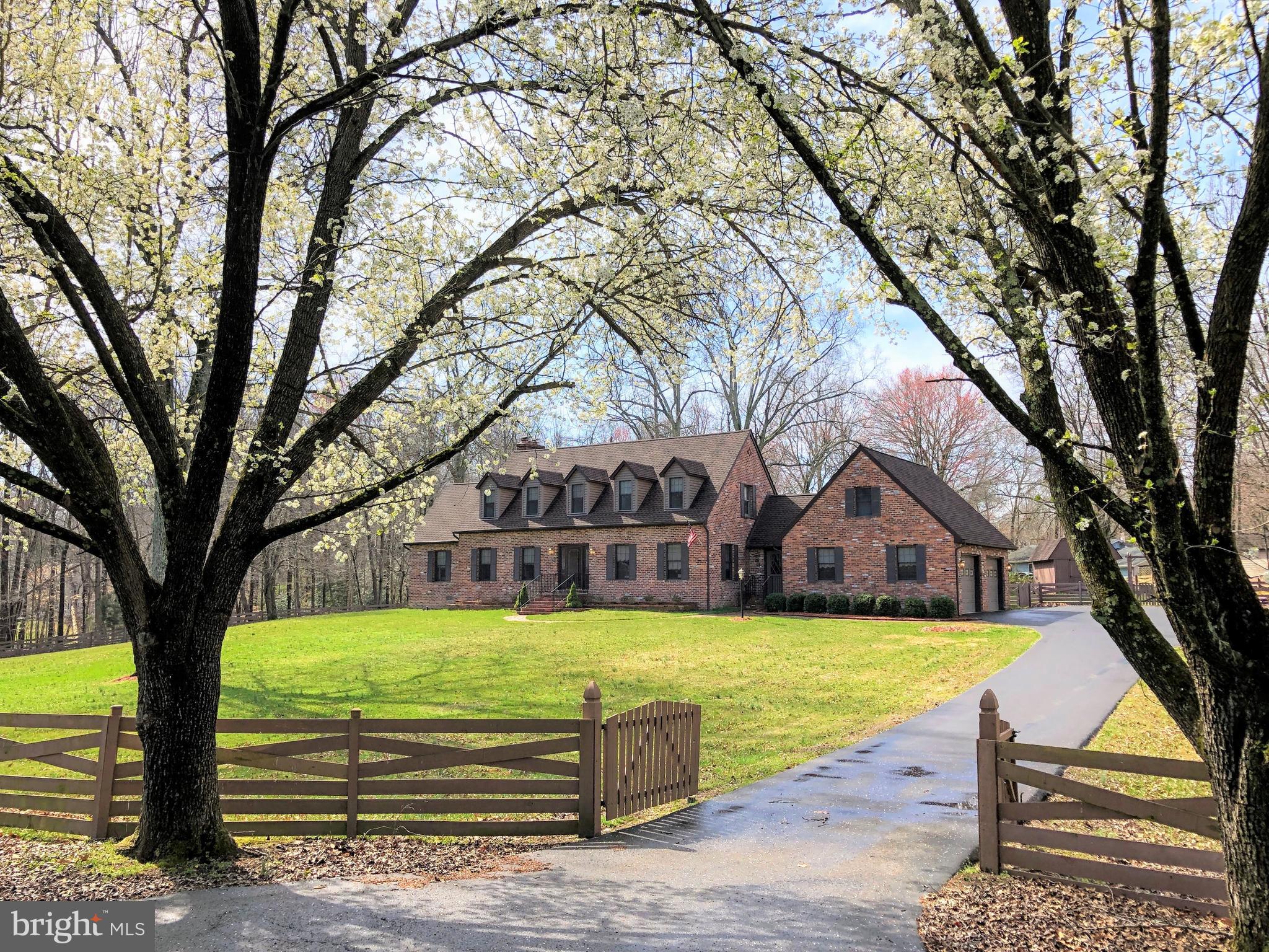 Home Sweet Home! Custom brick home on 1 acre with 3 levels, 4 bedrooms & 3 1/2 bathrooms. This beautiful home features wood floors, new carpet, custom trim throughout, cherry cabinets & walk-in pantry. First floor bedroom and bathroom in addition to 3 bedrooms upstairs. Family room with pellet stove, formal living room and dining room and breakfast nook. Large master suite features an office that can be used as a dressing area. Entertain all spring and summer on the patio overlooking the huge fenced backyard with an inground pool (brand new filter, pump & custom cover being installed next week). Basement can be used as a wood workshop with saw dust vacuum and air filter or converted to a recreation room. Oversized side load garage is a mechanic's dream with air compressor, attic pull-down and ample space. Shed, gazebo, historic brick, intercom system, central vacuum, large parking area, house wired for generator on wheels in shed & more! No HOA, school excise tax or def water & sewer fees. Septic & well (no water bill!). Conveniently located and easy commute to Joint Base Andrews, Pentagon, Bolling, MD-5, I-495 Beltway, Washington, DC, Virginia and Branch Avenue metro station. You don't want to miss this one!